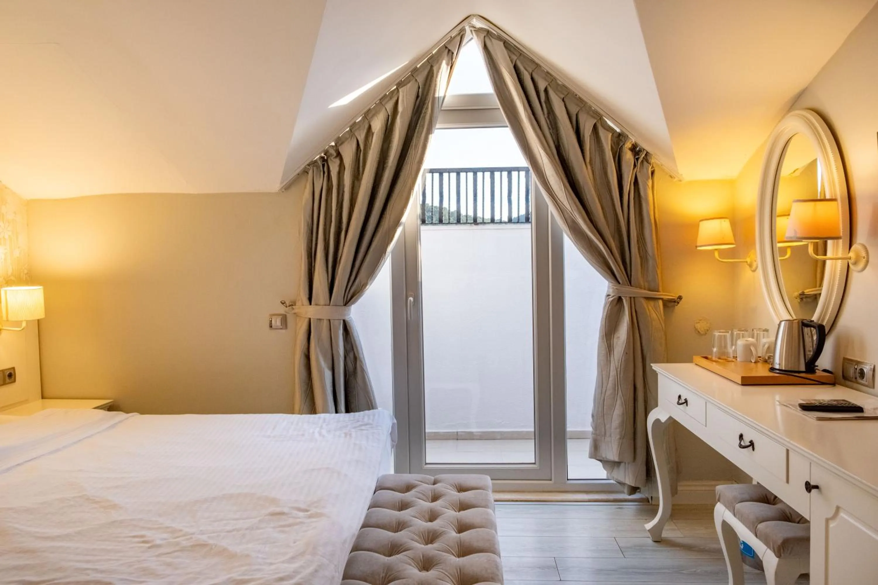 Bed in Pinehill Hotel & Suites