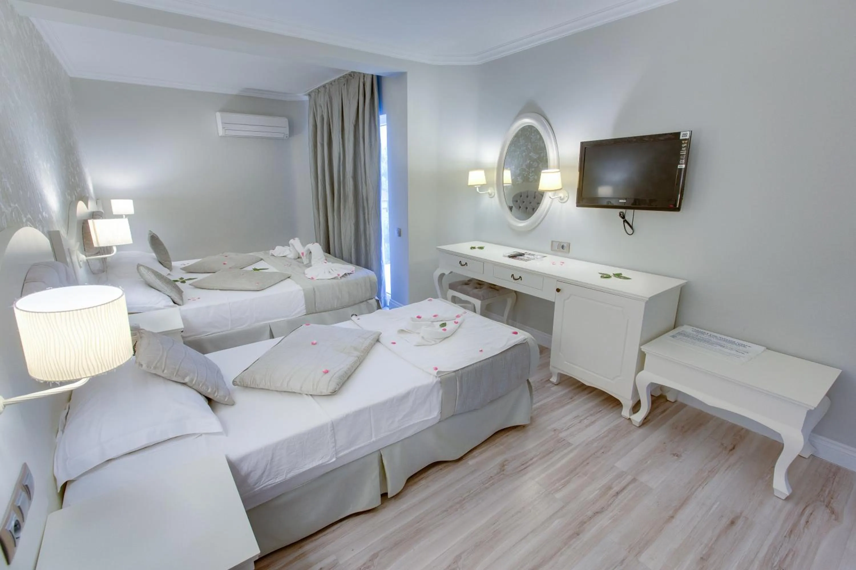 Photo of the whole room, Bed in Pinehill Hotel & Suites