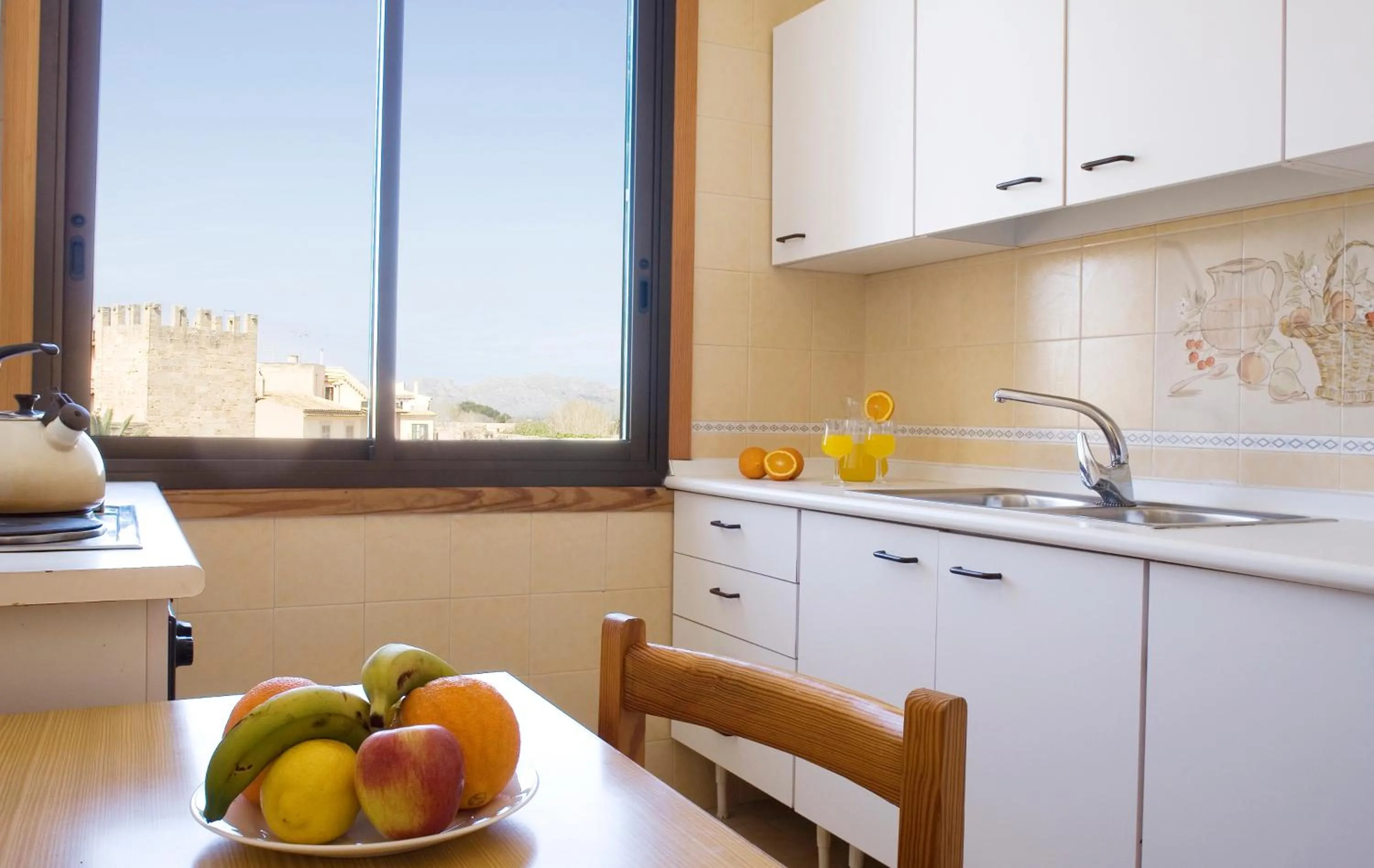 Kitchen or kitchenette in Apartamentos Carlos V