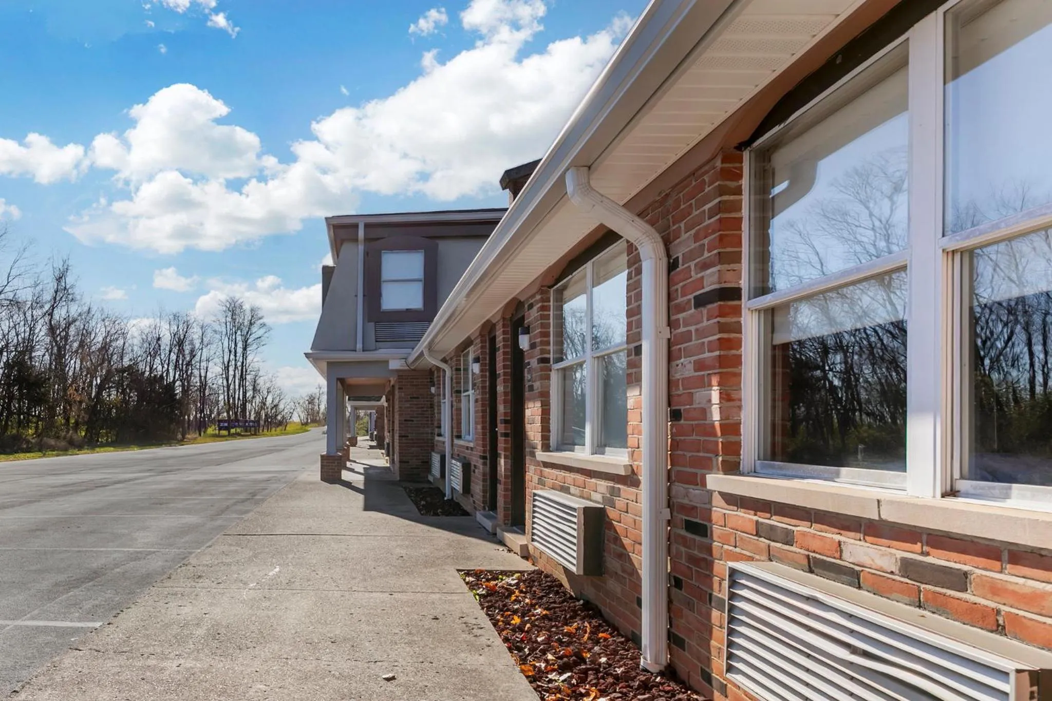 Property building in HomeTowne Studios by Red Roof Georgetown, KY