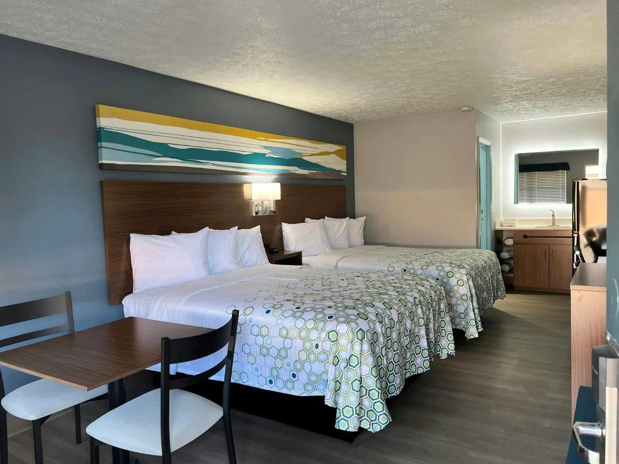 Photo of the whole room, Bed in HomeTowne Studios by Red Roof Georgetown, KY