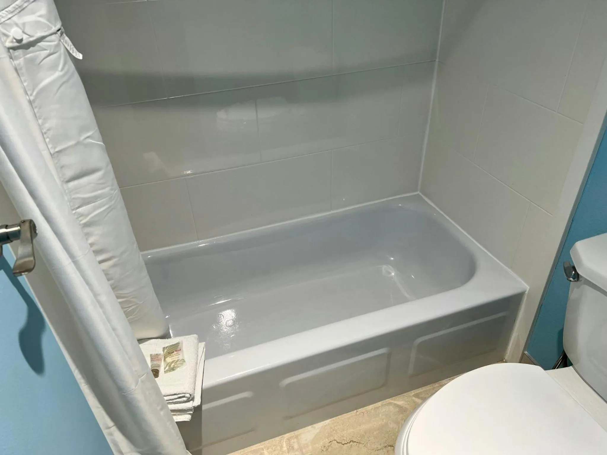 Shower in HomeTowne Studios by Red Roof Georgetown, KY