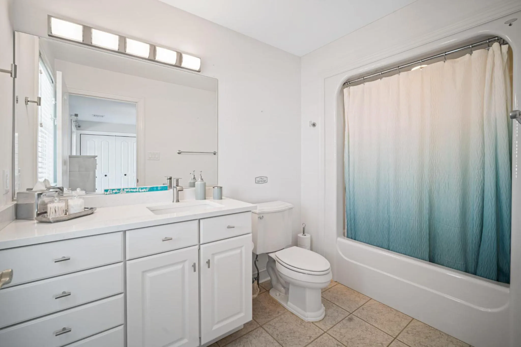 Bathroom in Exquisitely Large Home Block and a half to Beach
