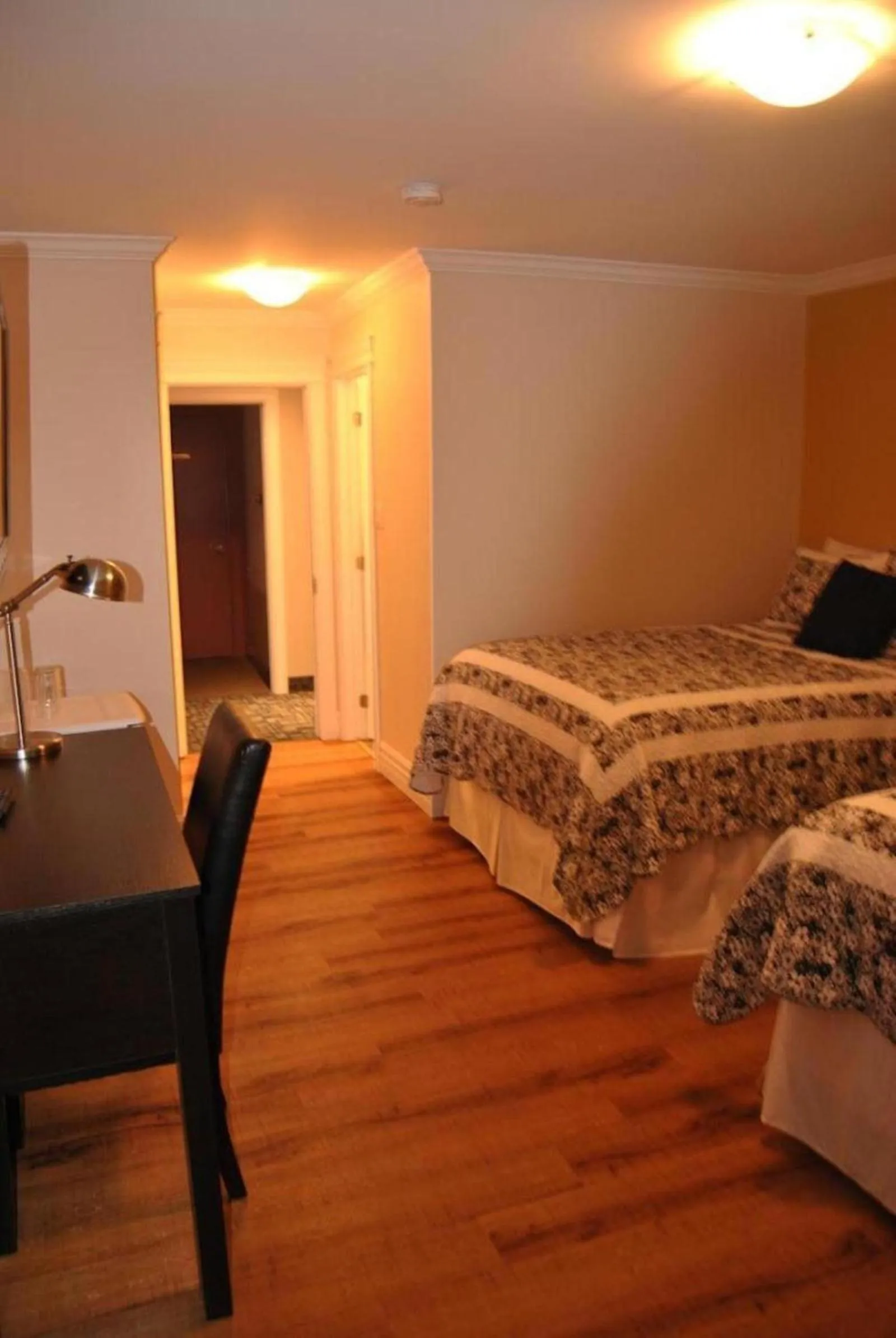 Bed in Arnold's Cove Inn