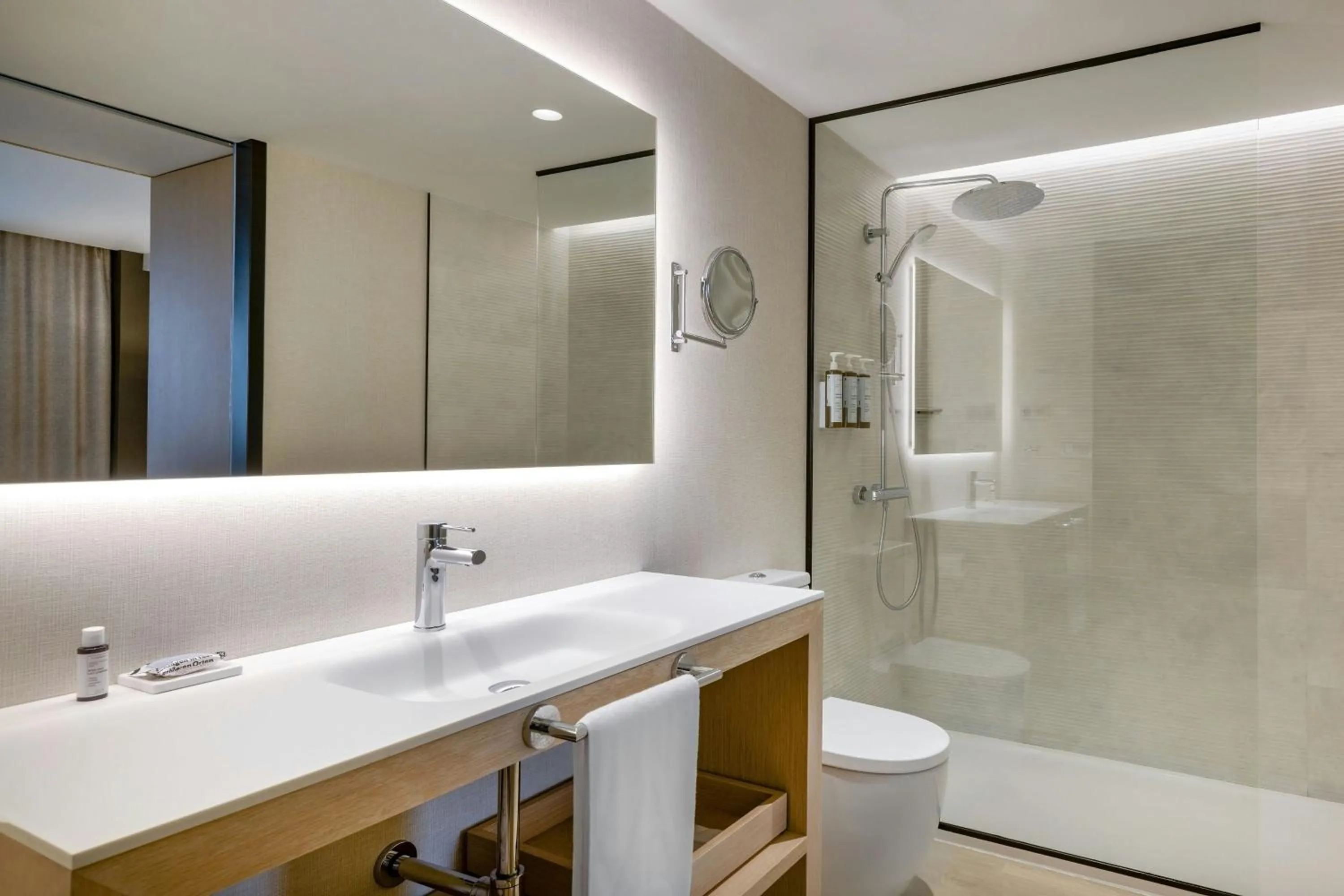 Bathroom in AC Hotel Victoria Suites by Marriott