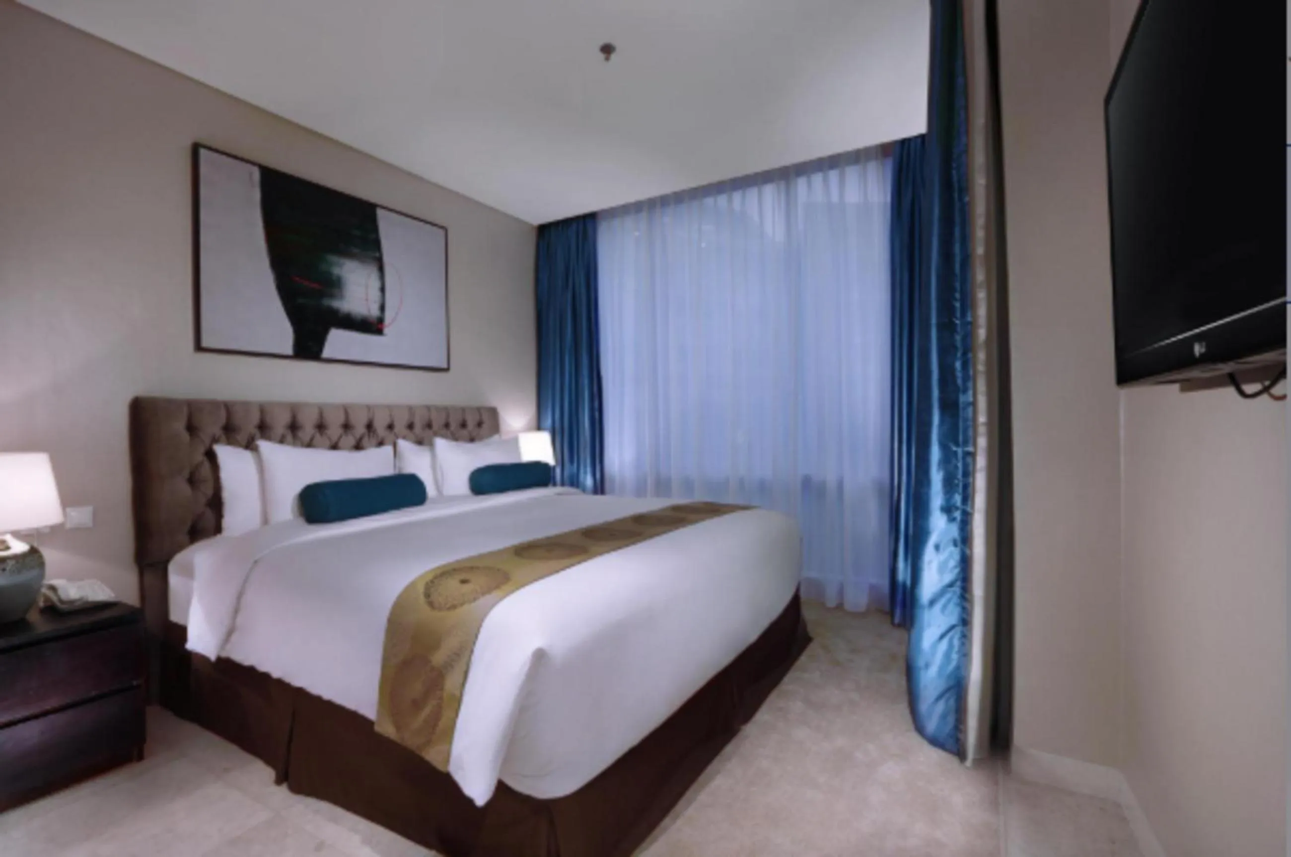Bed in The Grove Suites by Grand Aston