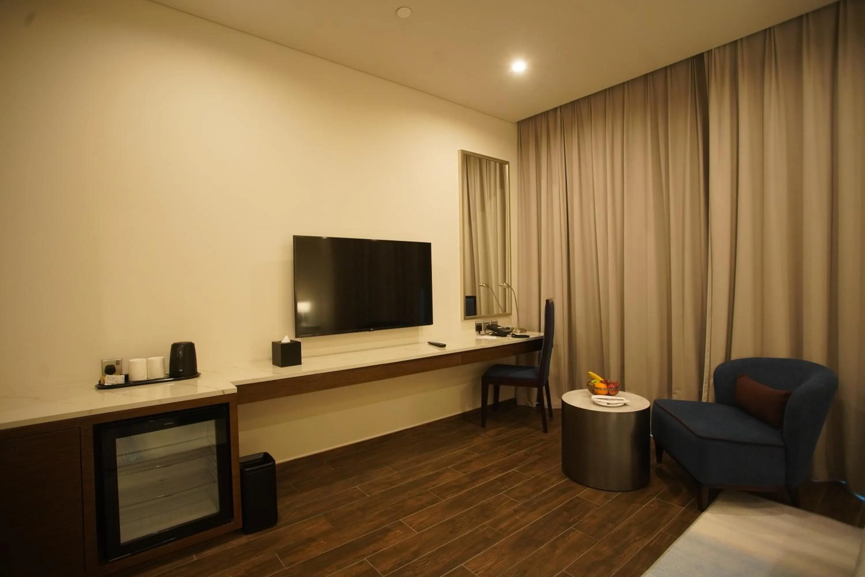 TV and multimedia in C - Hotel and Suites Doha