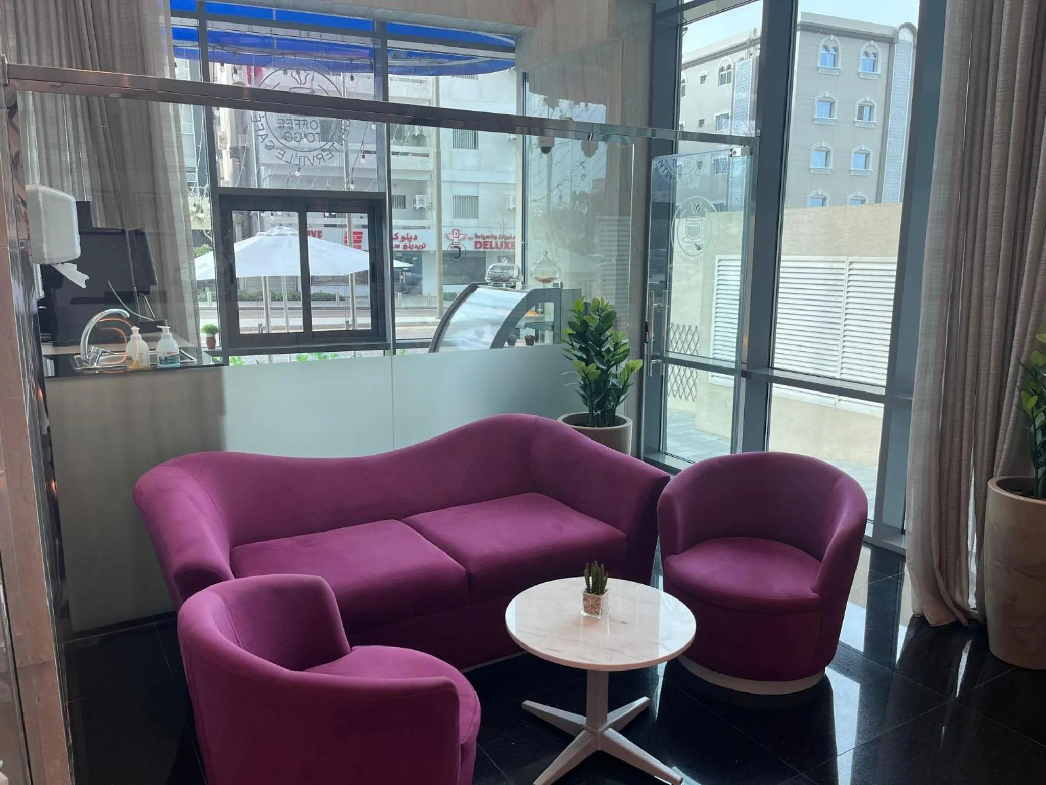 Lobby or reception in C - Hotel and Suites Doha