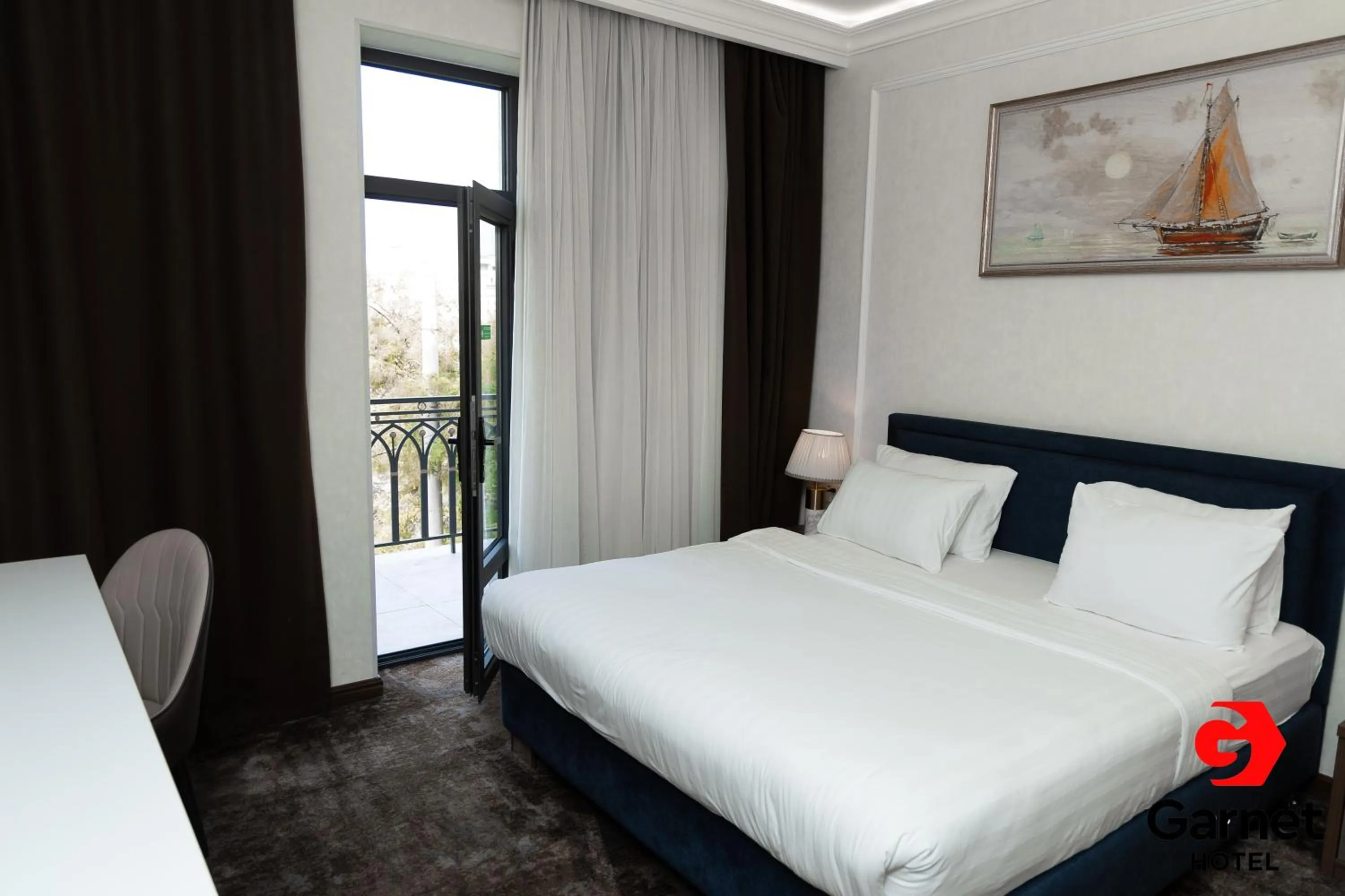 Balcony/Terrace, Bed in Garnet Hotel Tashkent
