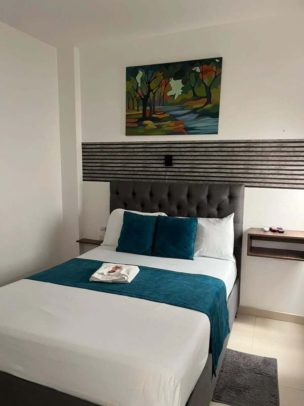 Bed in ANAJIRAWAA HOTEL