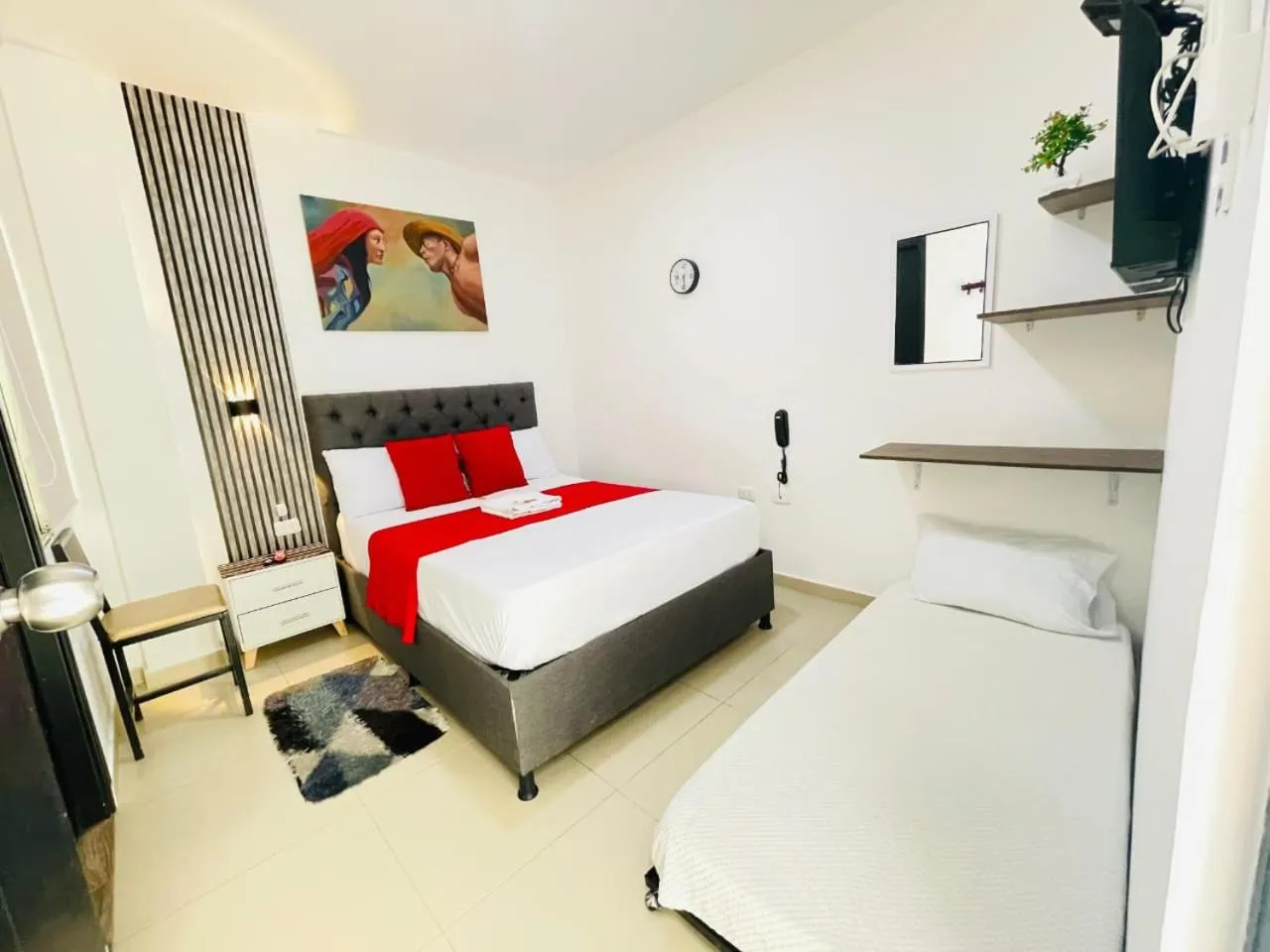 Bed in ANAJIRAWAA HOTEL