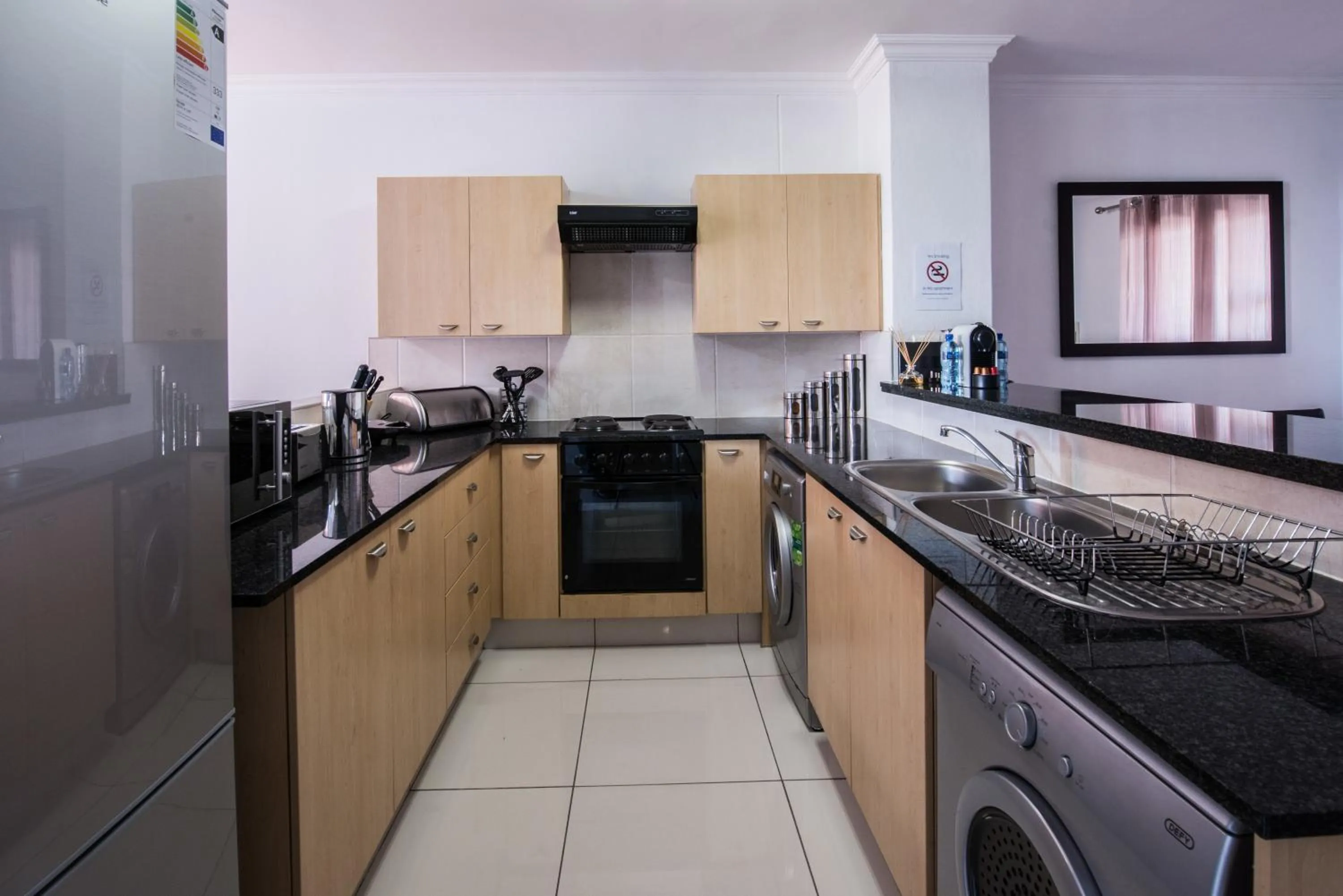 Kitchen or kitchenette in Prestige Apartments Sandton at Westpoint