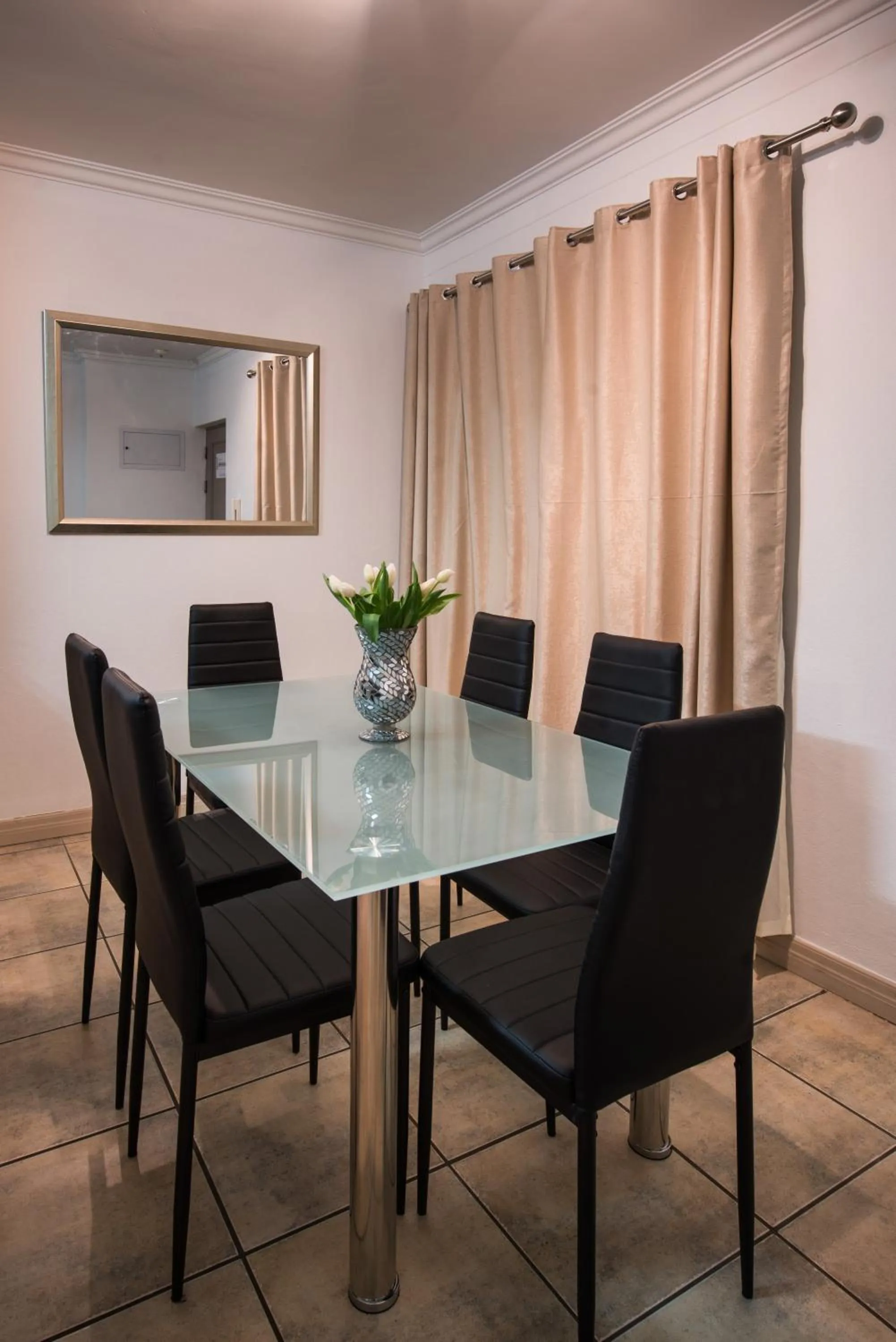 Dining area in Prestige Apartments Sandton at Westpoint