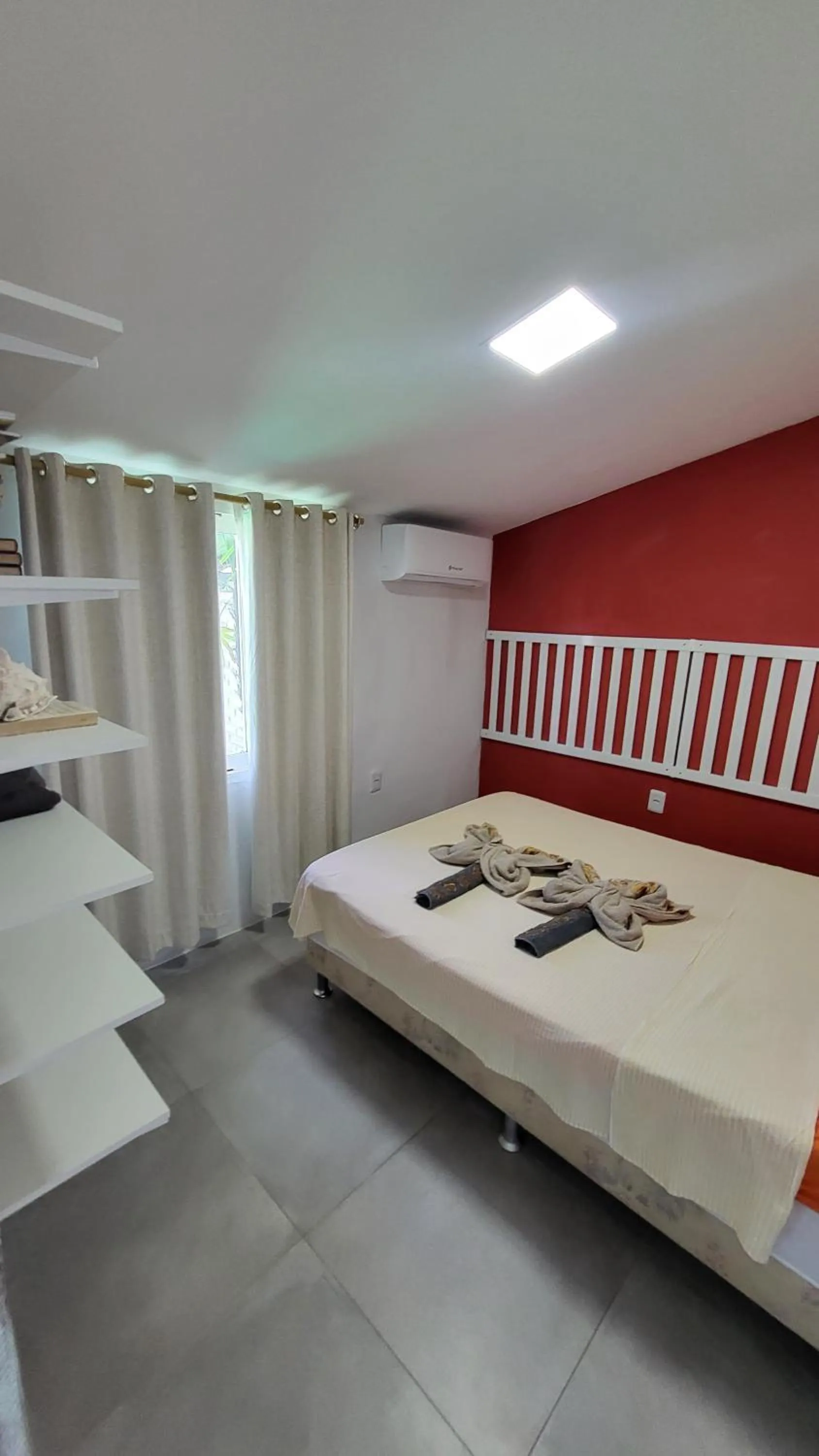 Bed in Tamboleiro's Hotel Residence