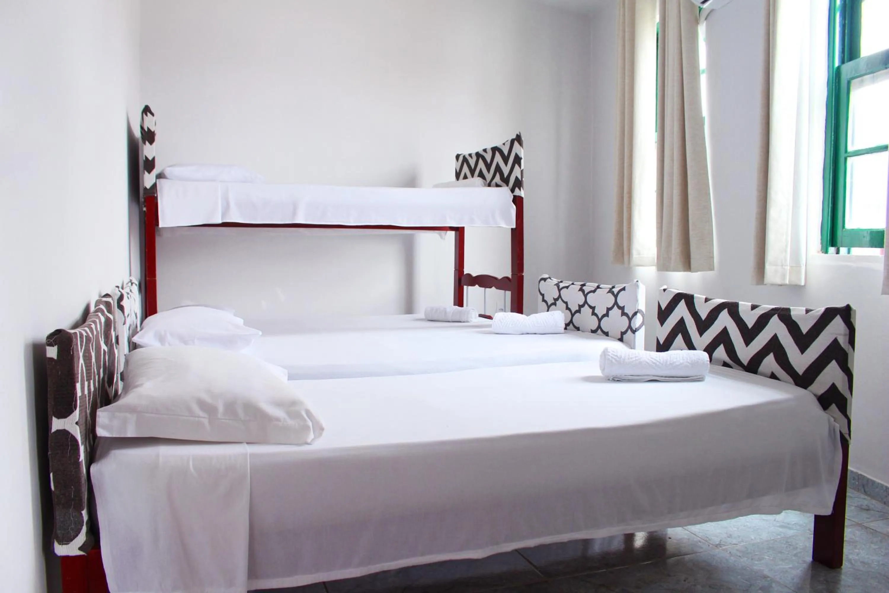 Bed in Tamboleiro's Hotel Residence