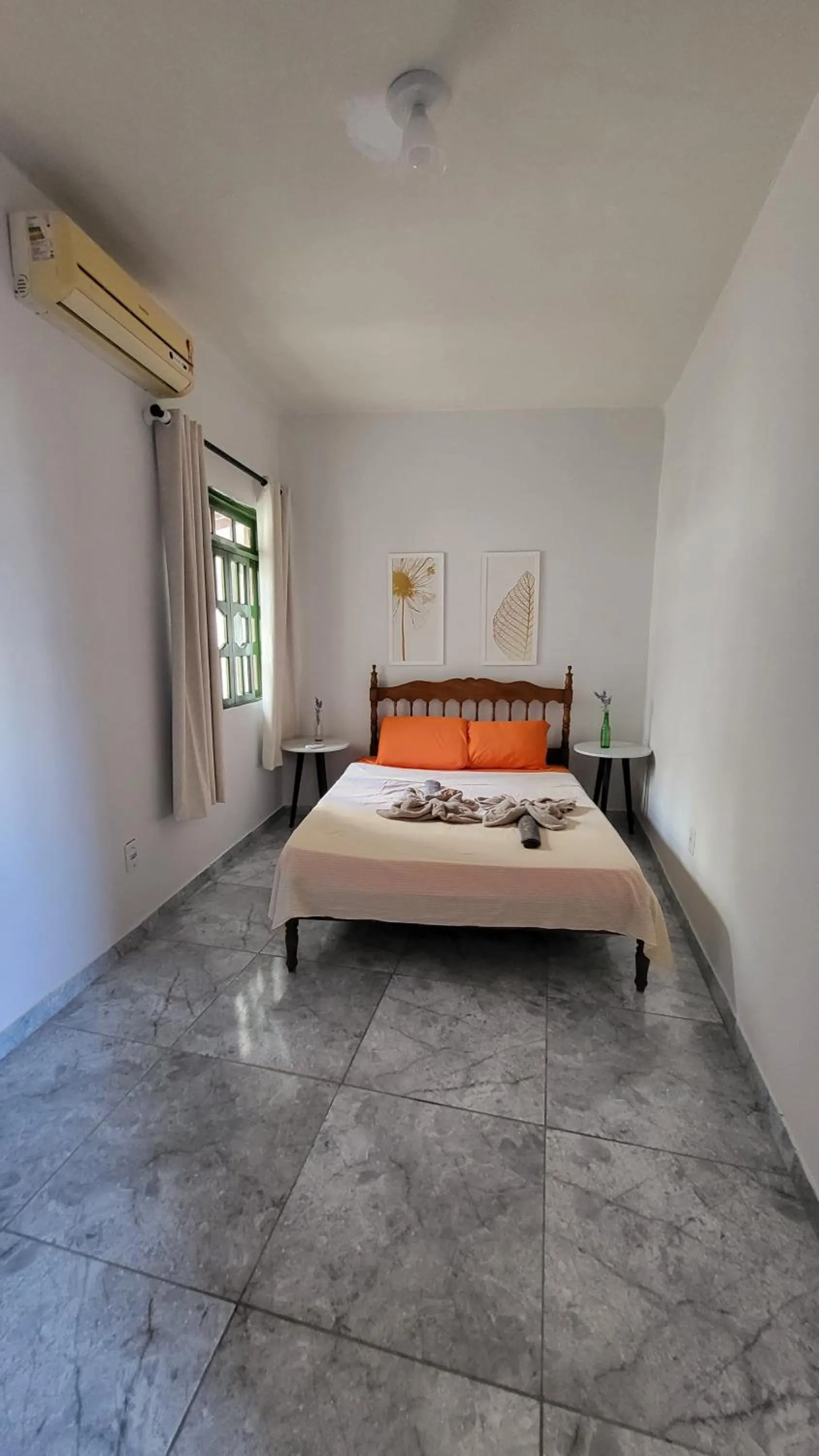 Bed in Tamboleiro's Hotel Residence