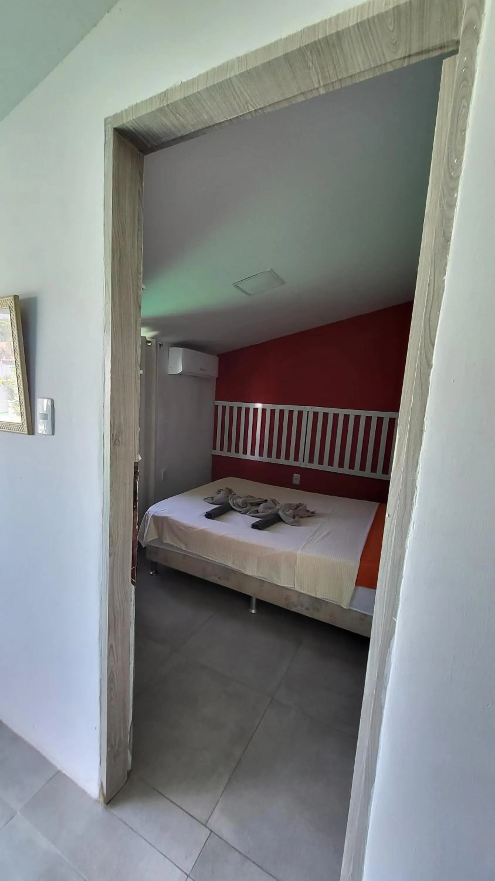 Bed in Tamboleiro's Hotel Residence