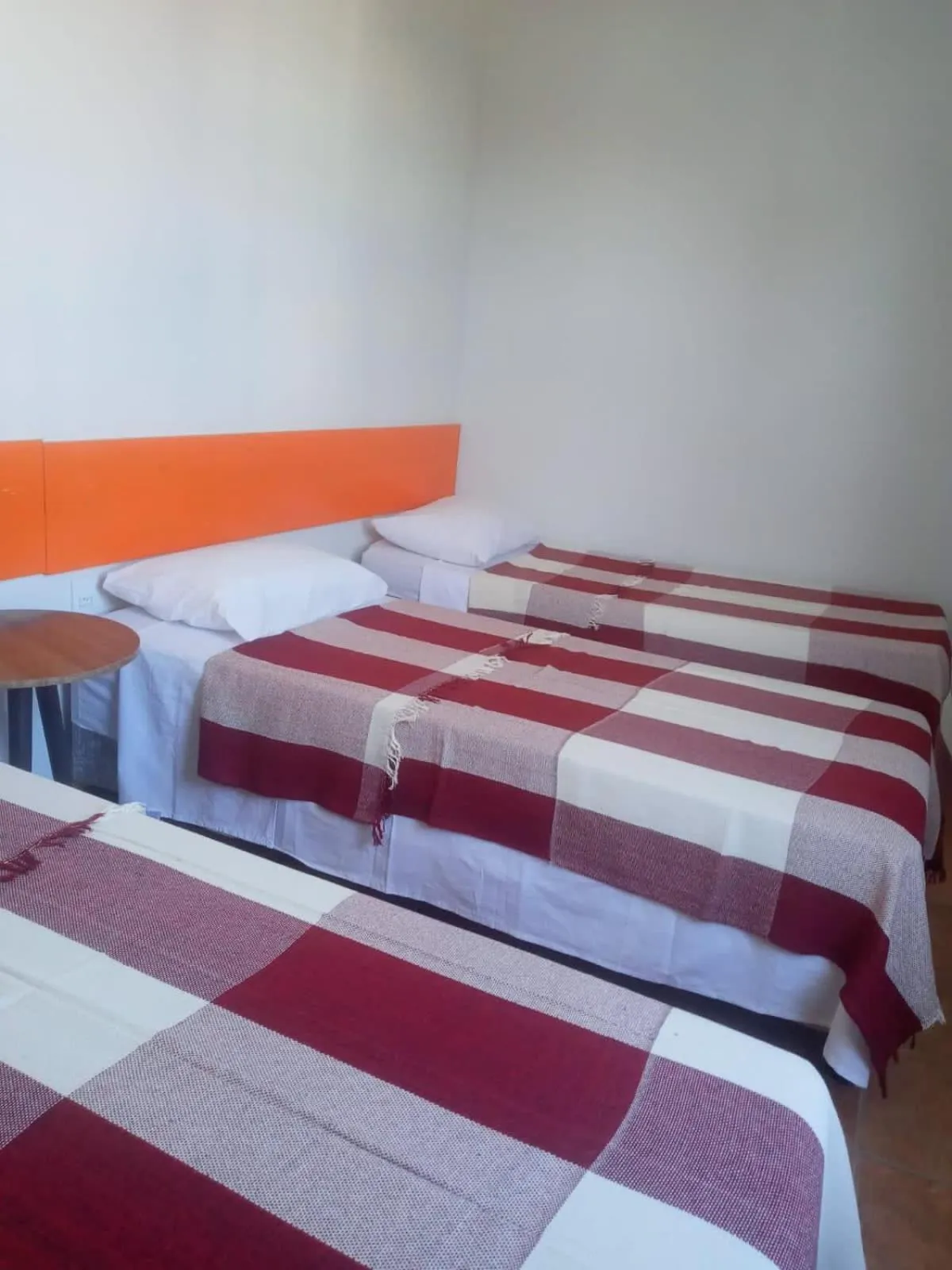 Bed in Tamboleiro's Hotel Residence