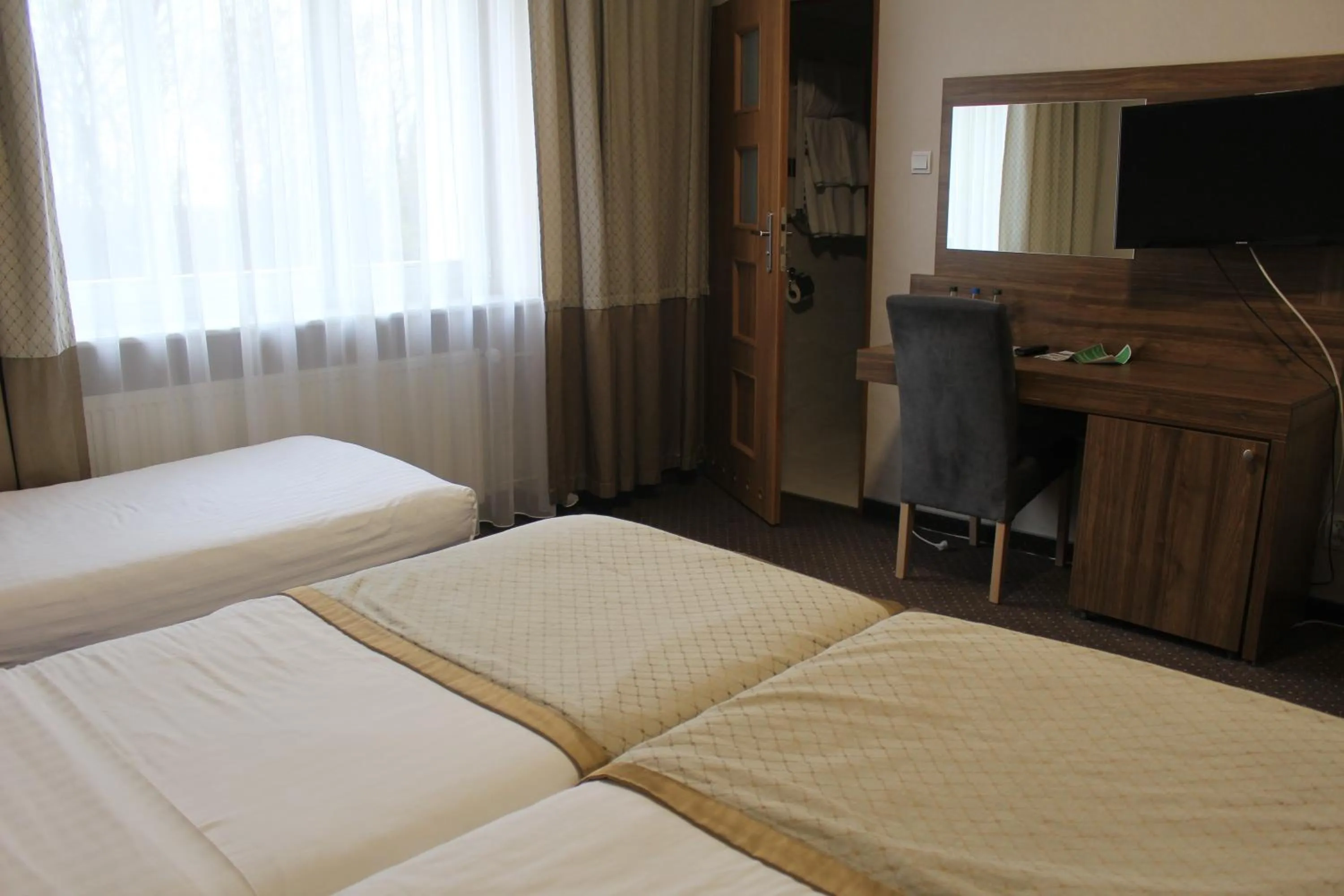 Communal lounge/ TV room in Wielspin Puszczykowo