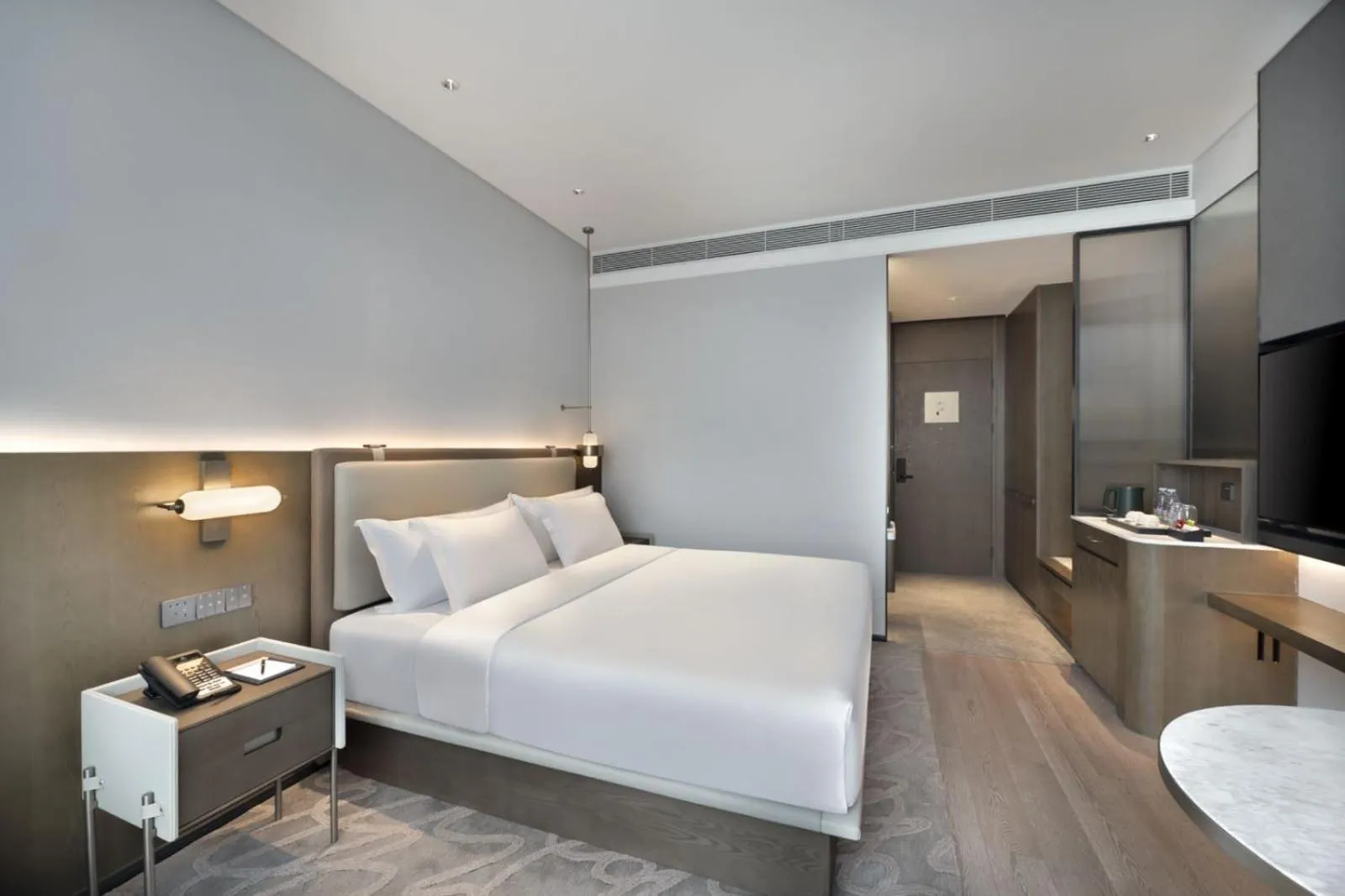 Photo of the whole room, Bed in The Barony Jinan East