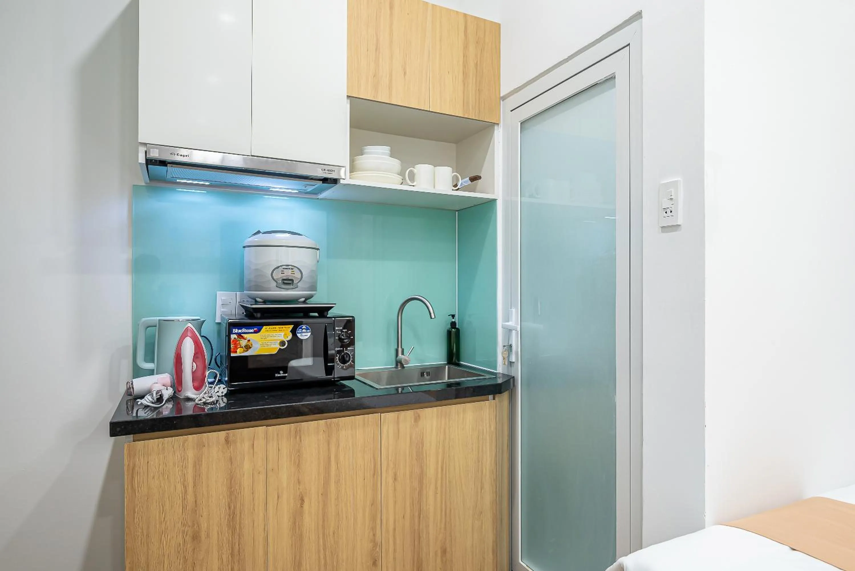 Kitchen or kitchenette in Cozrum Homes - Retro House