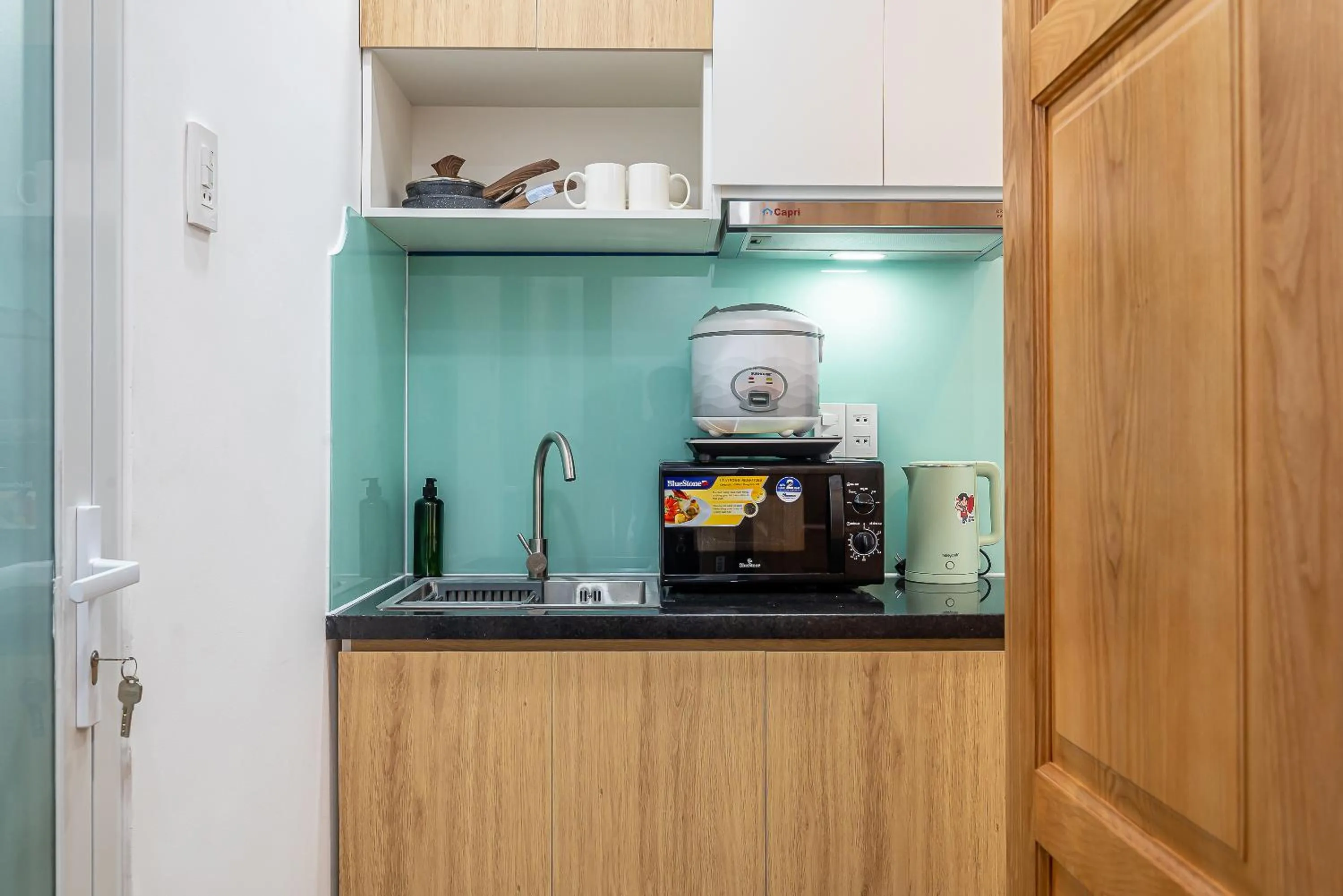 Kitchen or kitchenette in Cozrum Homes - Retro House