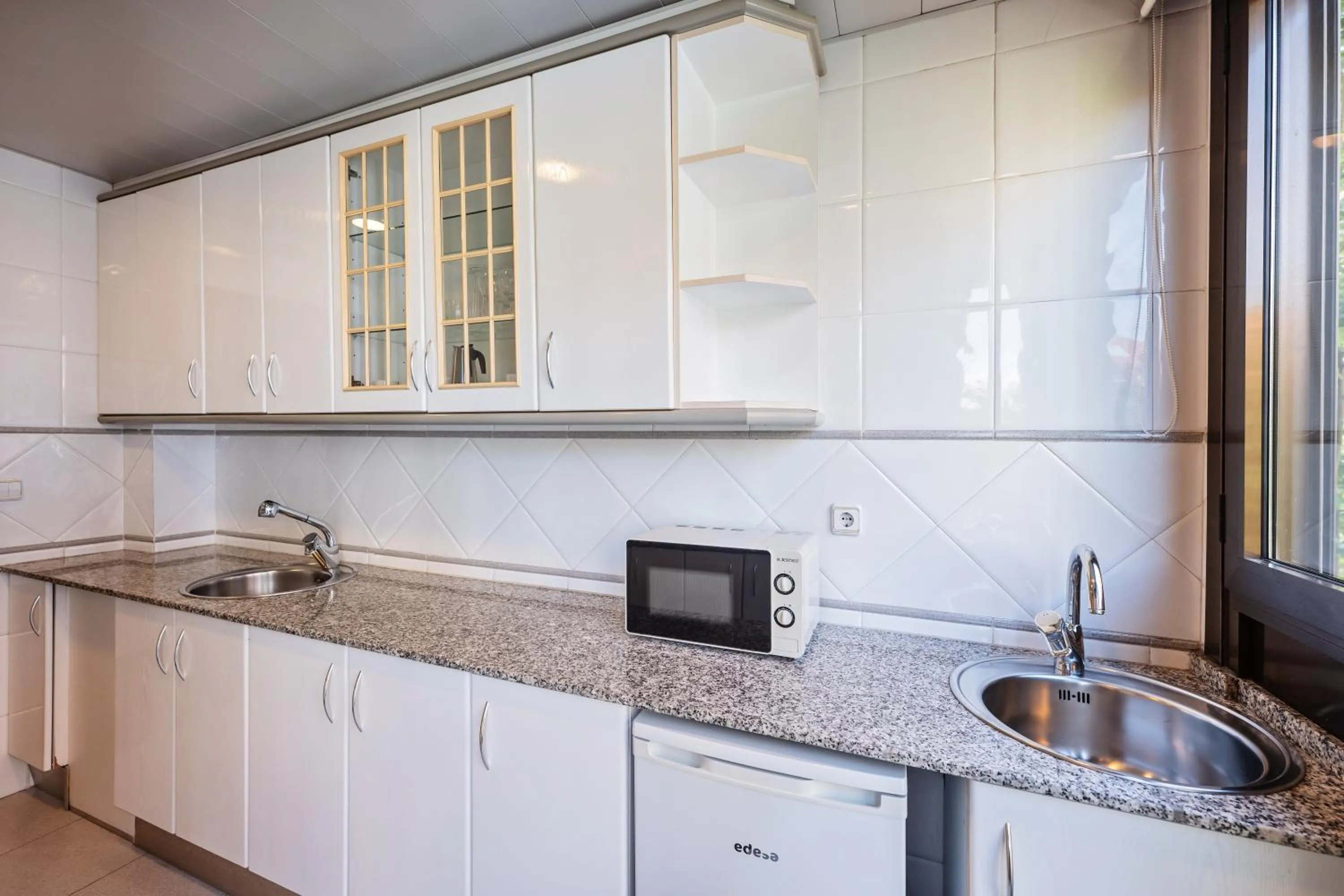 Kitchen or kitchenette in Aparthotel Napols - Abapart