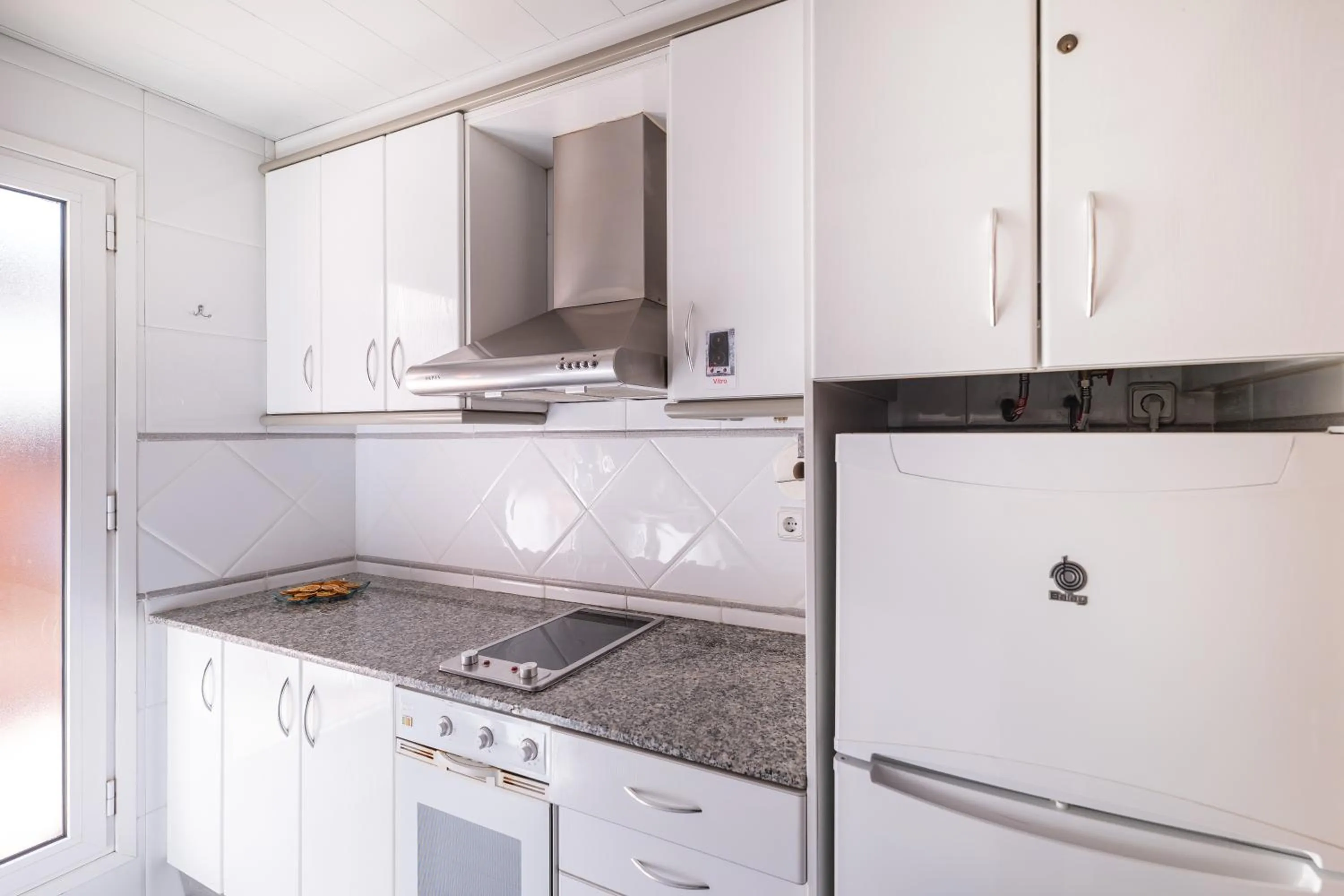 Kitchen or kitchenette in Aparthotel Napols - Abapart