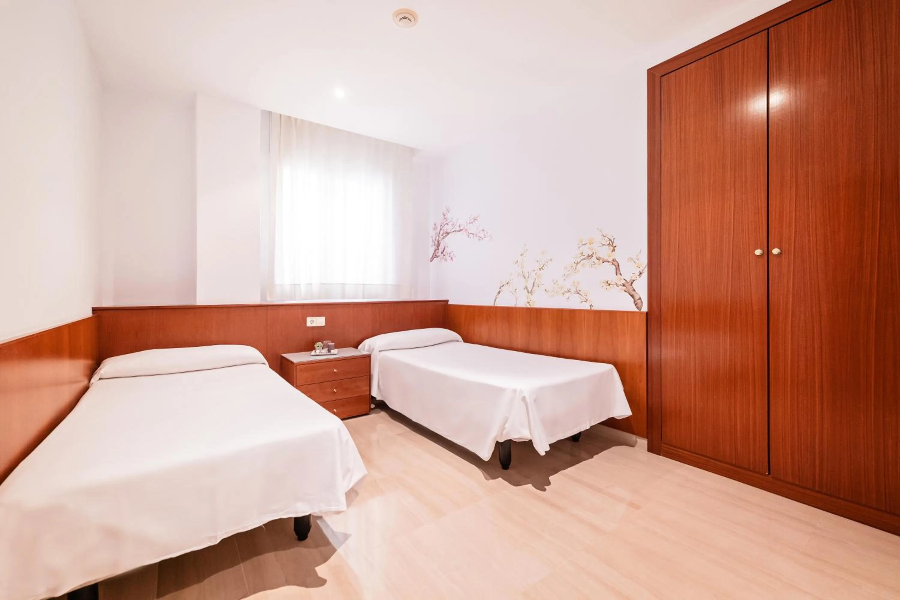 Bed in Aparthotel Napols - Abapart