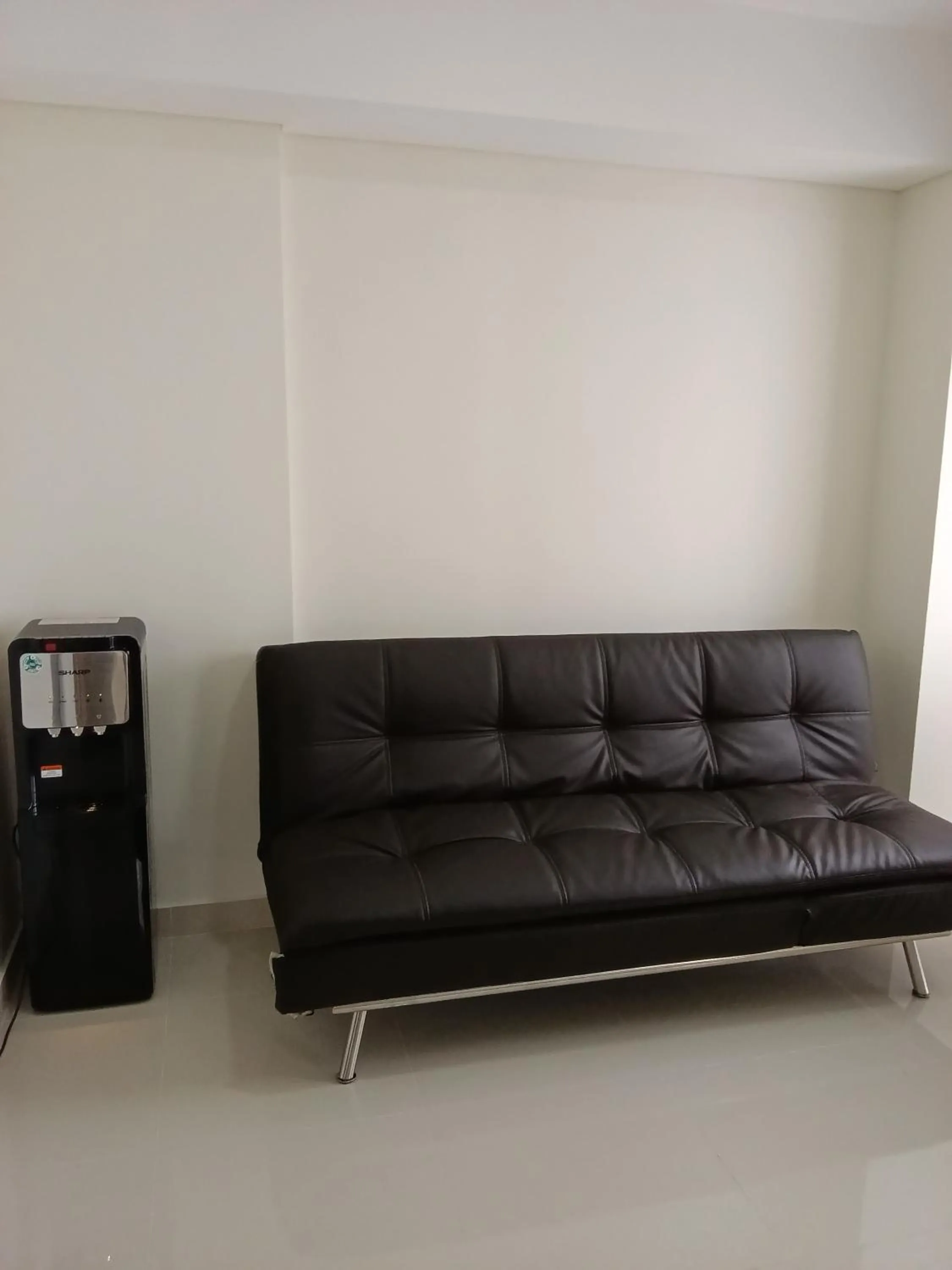 Seating area in Palam Mansion at Meisterstadt Pollux Habibie Apartment