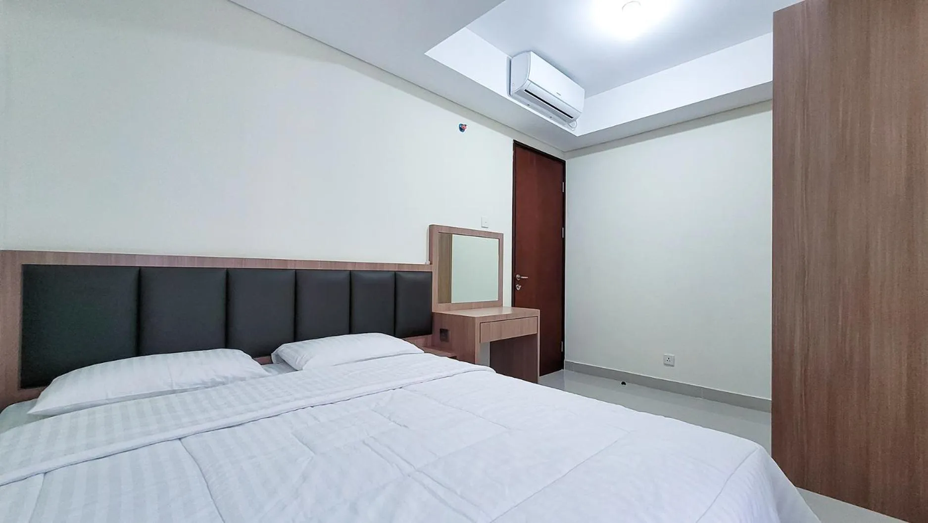 Bed in Palam Mansion at Meisterstadt Pollux Habibie Apartment