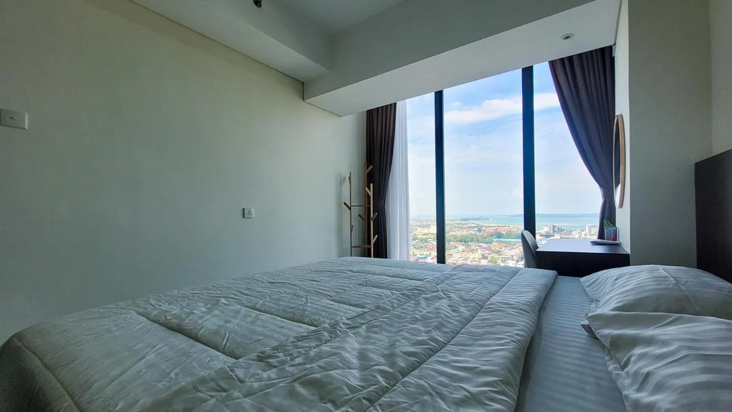 Bed in Palam Mansion at Meisterstadt Pollux Habibie Apartment