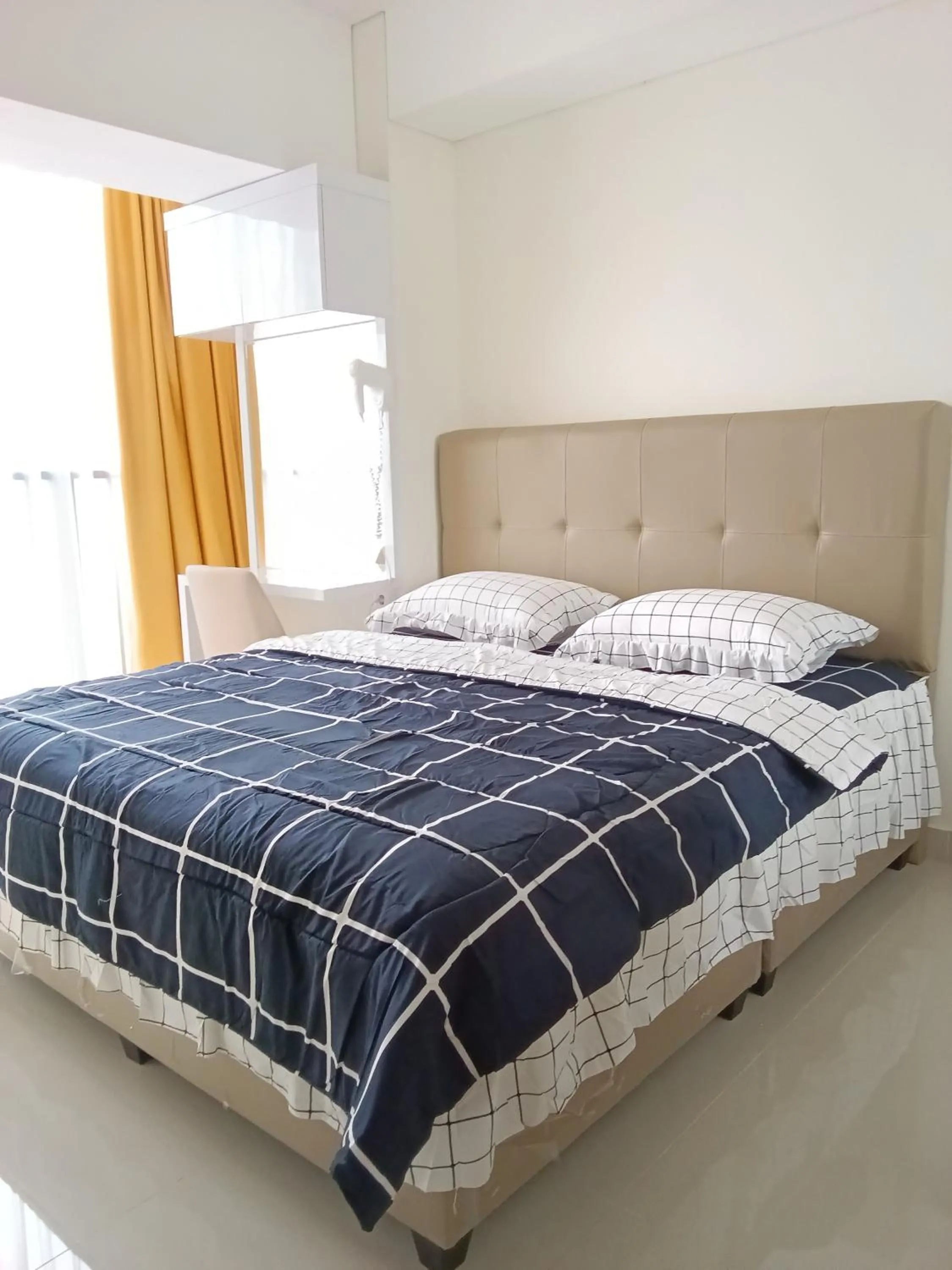 Bed in Palam Mansion at Meisterstadt Pollux Habibie Apartment