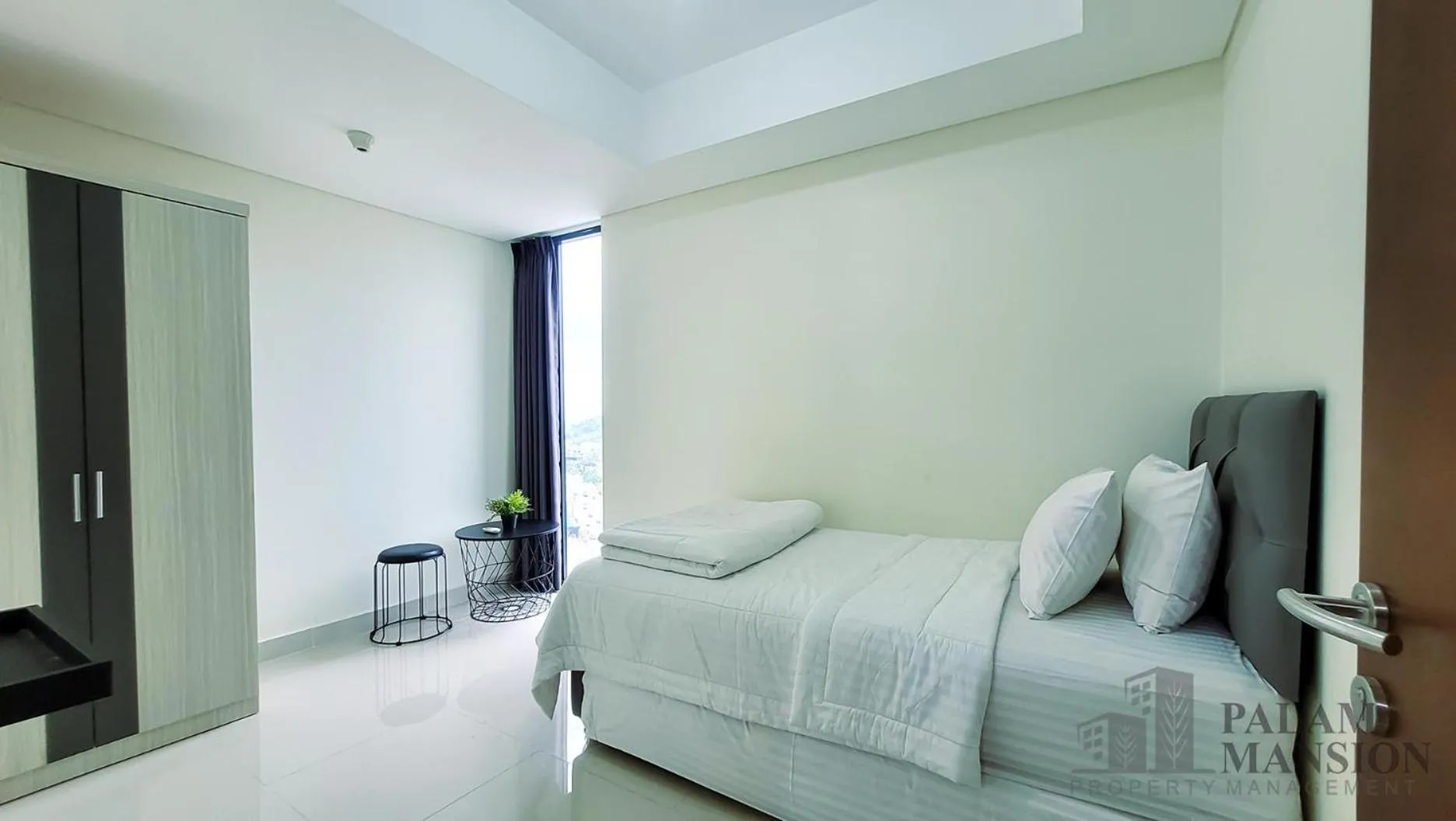 Bed in Palam Mansion at Meisterstadt Pollux Habibie Apartment