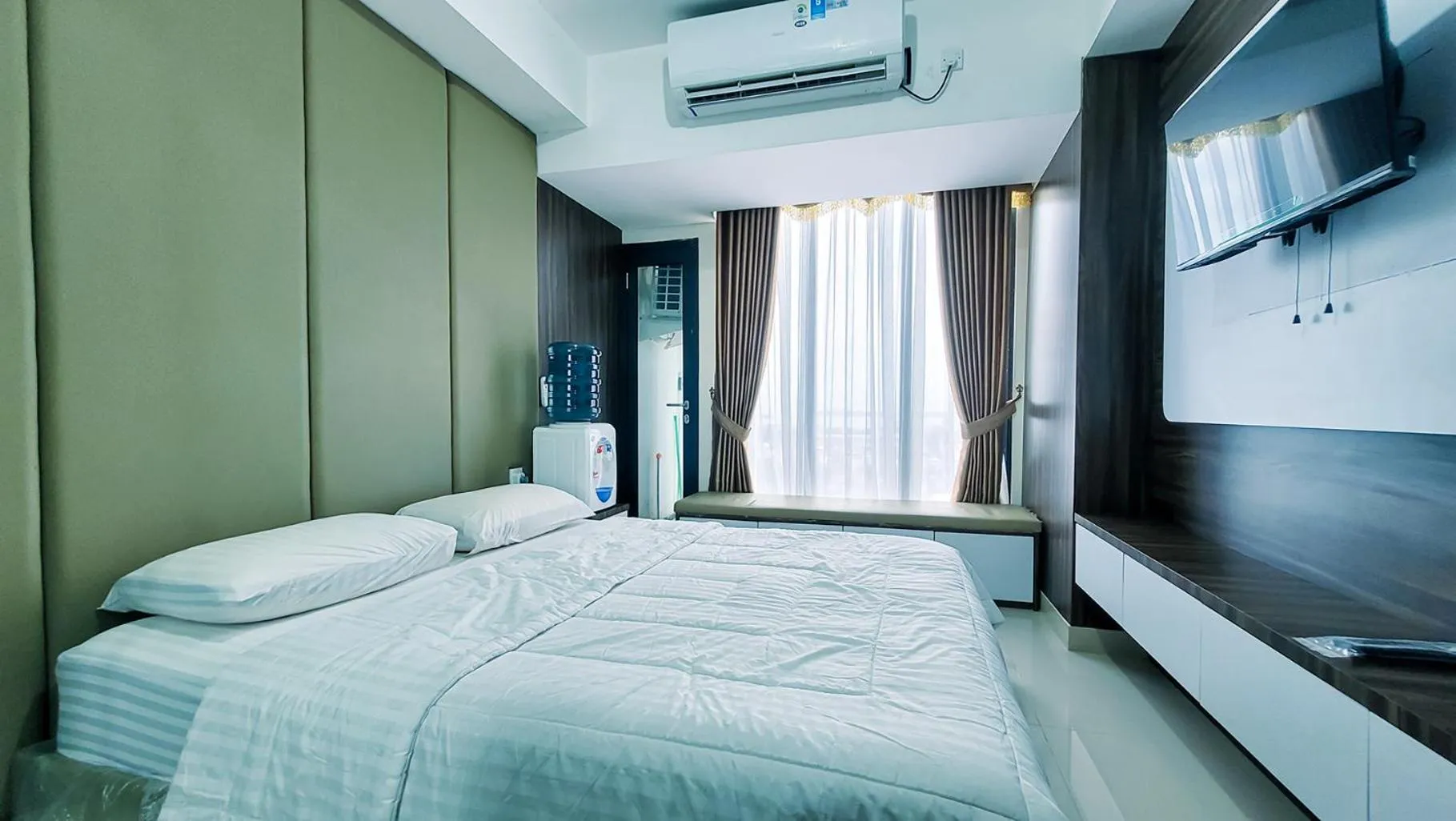 Bed in Palam Mansion at Meisterstadt Pollux Habibie Apartment