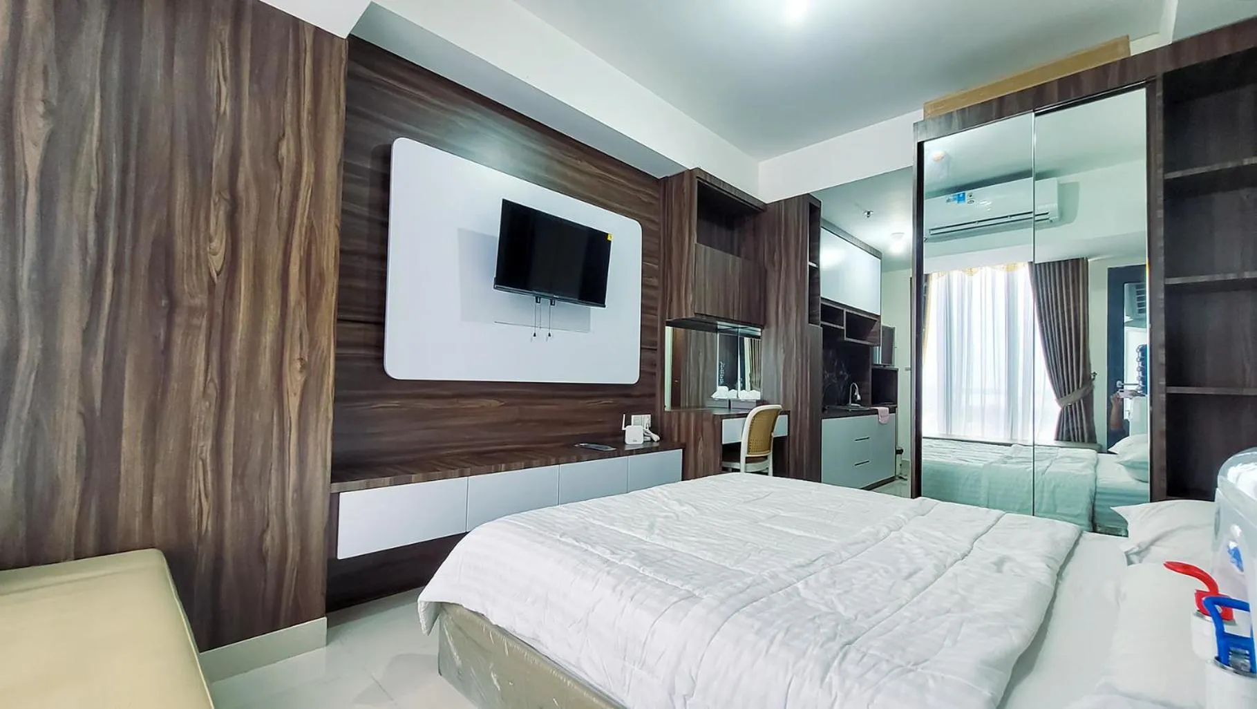 Bed in Palam Mansion at Meisterstadt Pollux Habibie Apartment