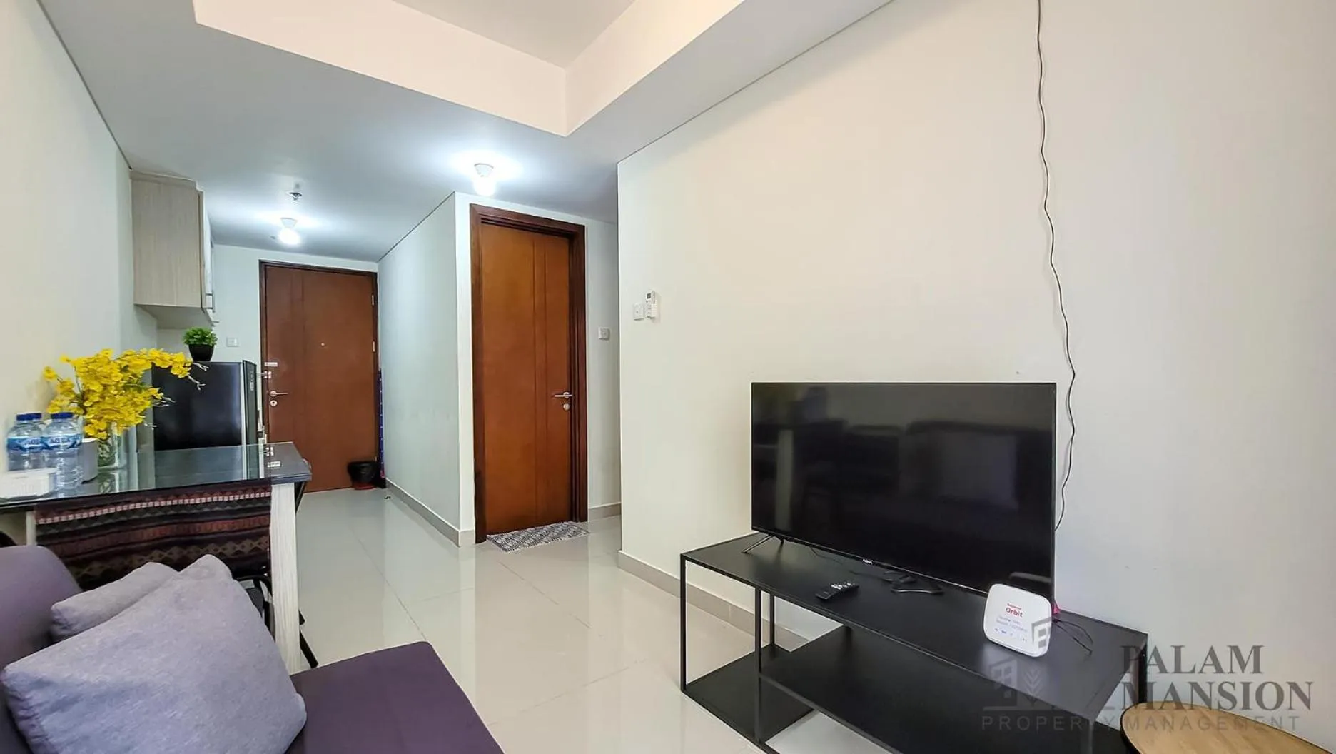 TV and multimedia in Palam Mansion at Meisterstadt Pollux Habibie Apartment