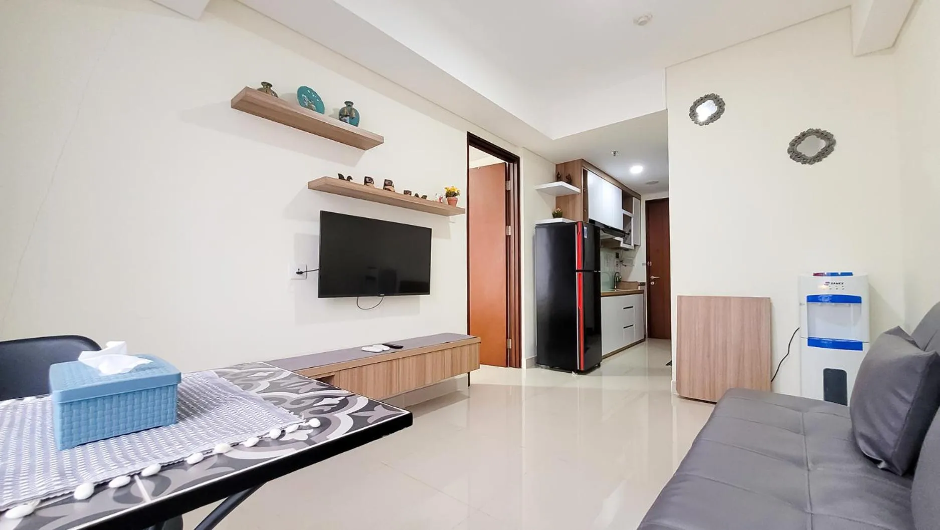 TV and multimedia in Palam Mansion at Meisterstadt Pollux Habibie Apartment