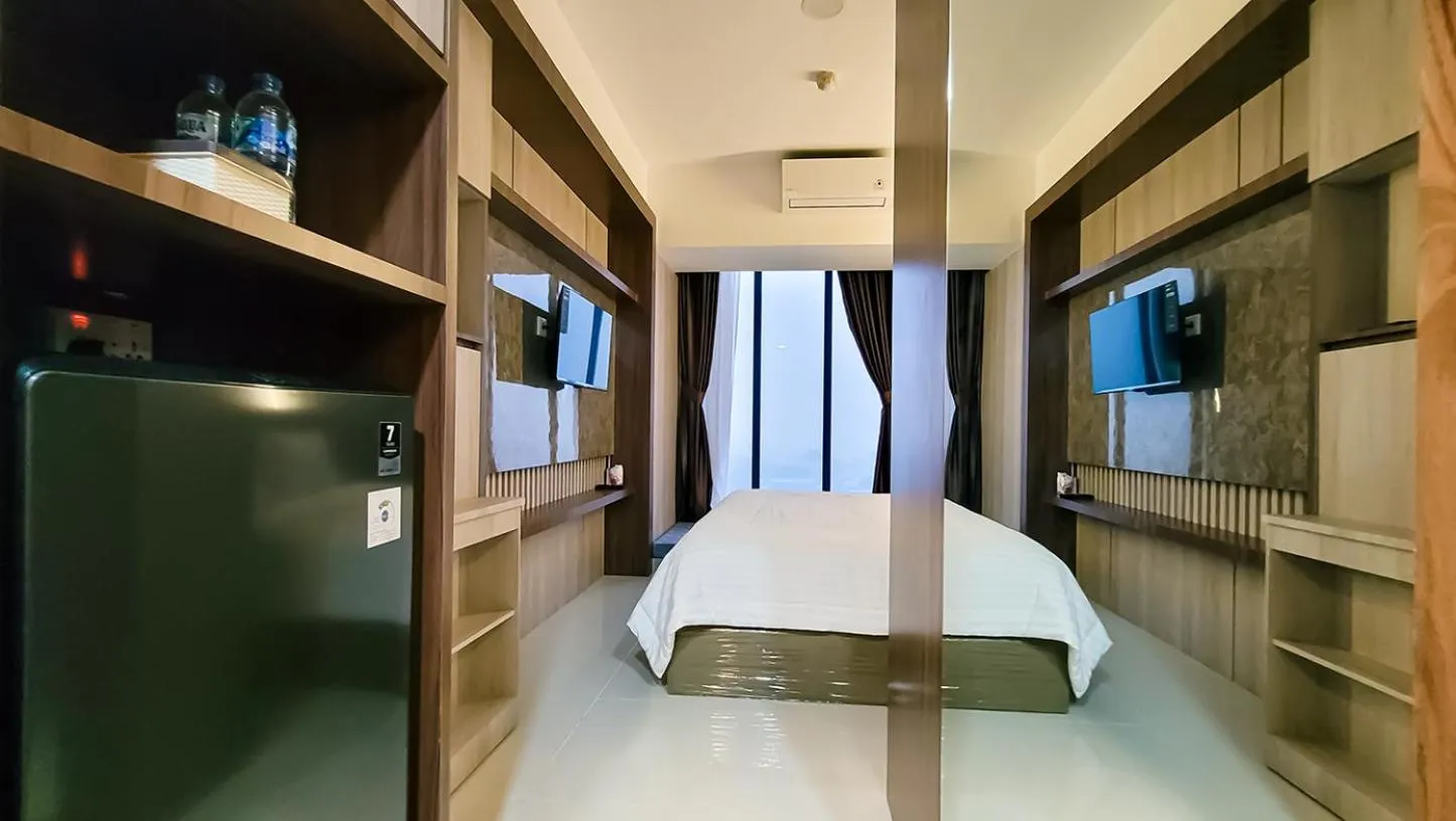 Bed in Palam Mansion at Meisterstadt Pollux Habibie Apartment