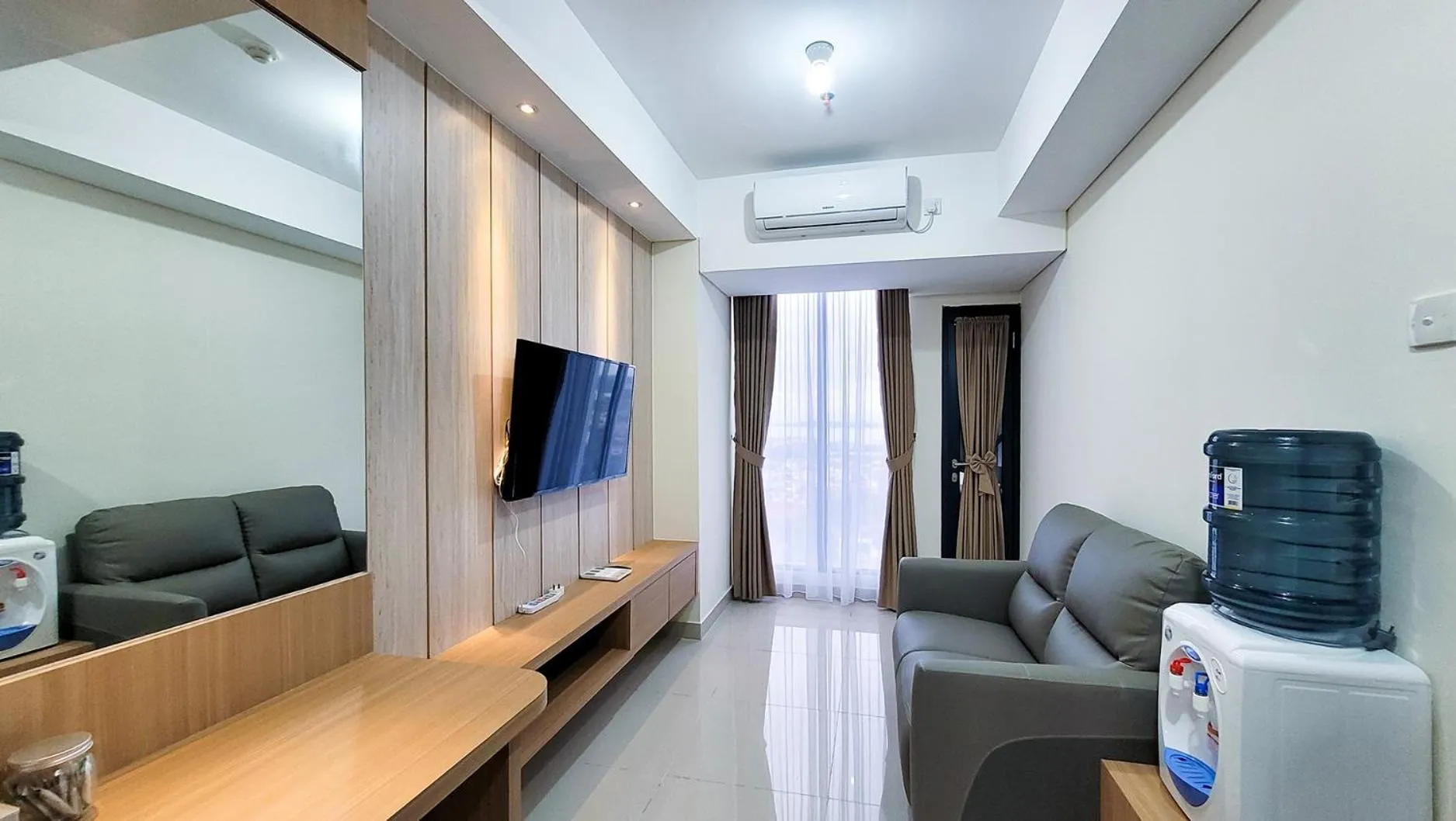 Living room in Palam Mansion at Meisterstadt Pollux Habibie Apartment