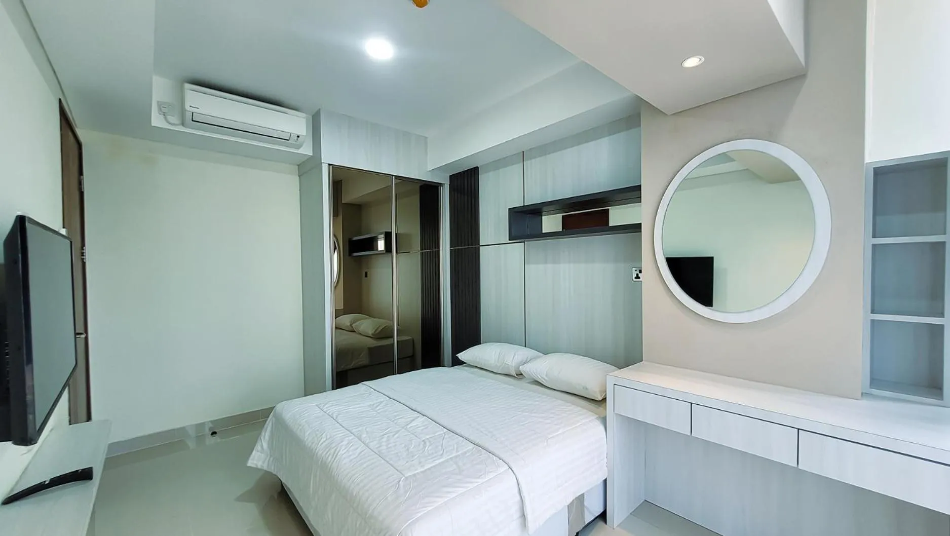 Bed in Palam Mansion at Meisterstadt Pollux Habibie Apartment