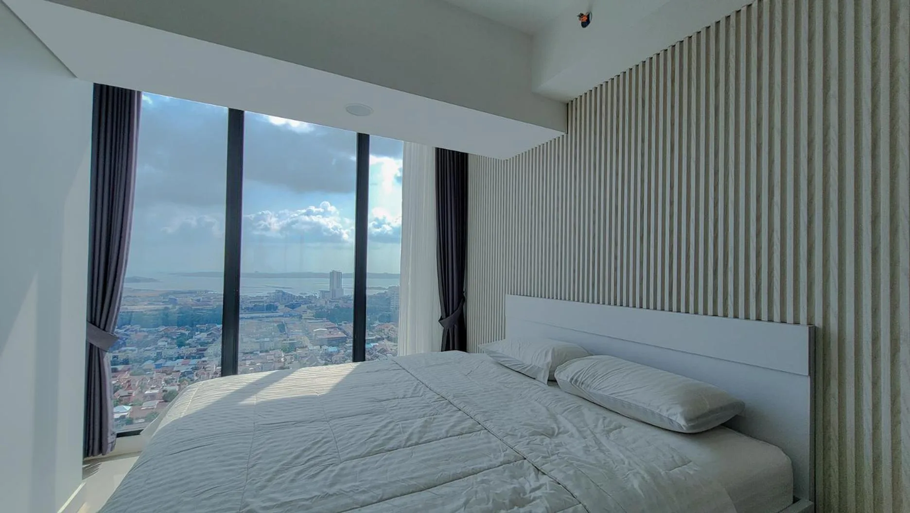 Bed in Palam Mansion at Meisterstadt Pollux Habibie Apartment