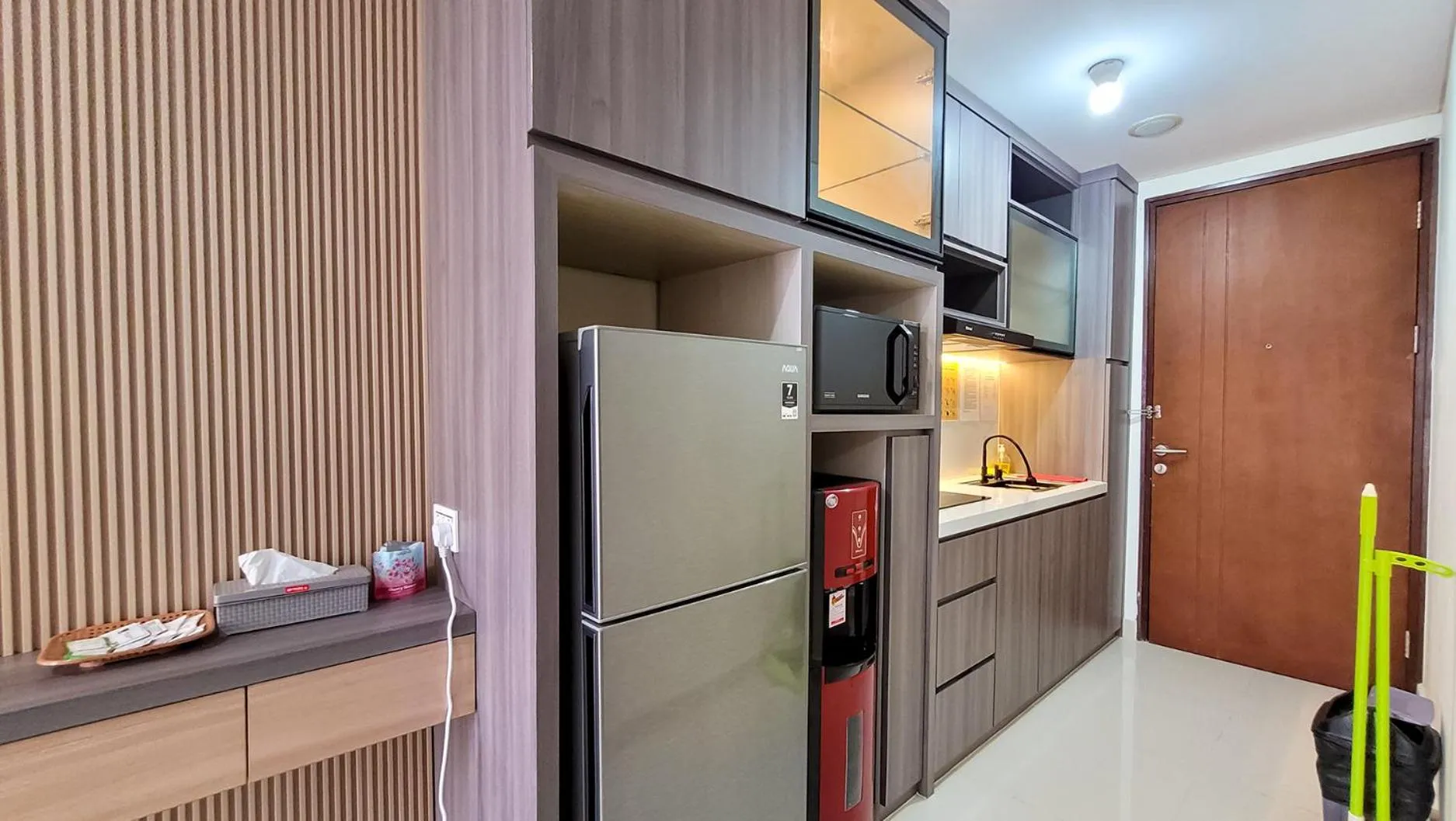Kitchen or kitchenette in Palam Mansion at Meisterstadt Pollux Habibie Apartment