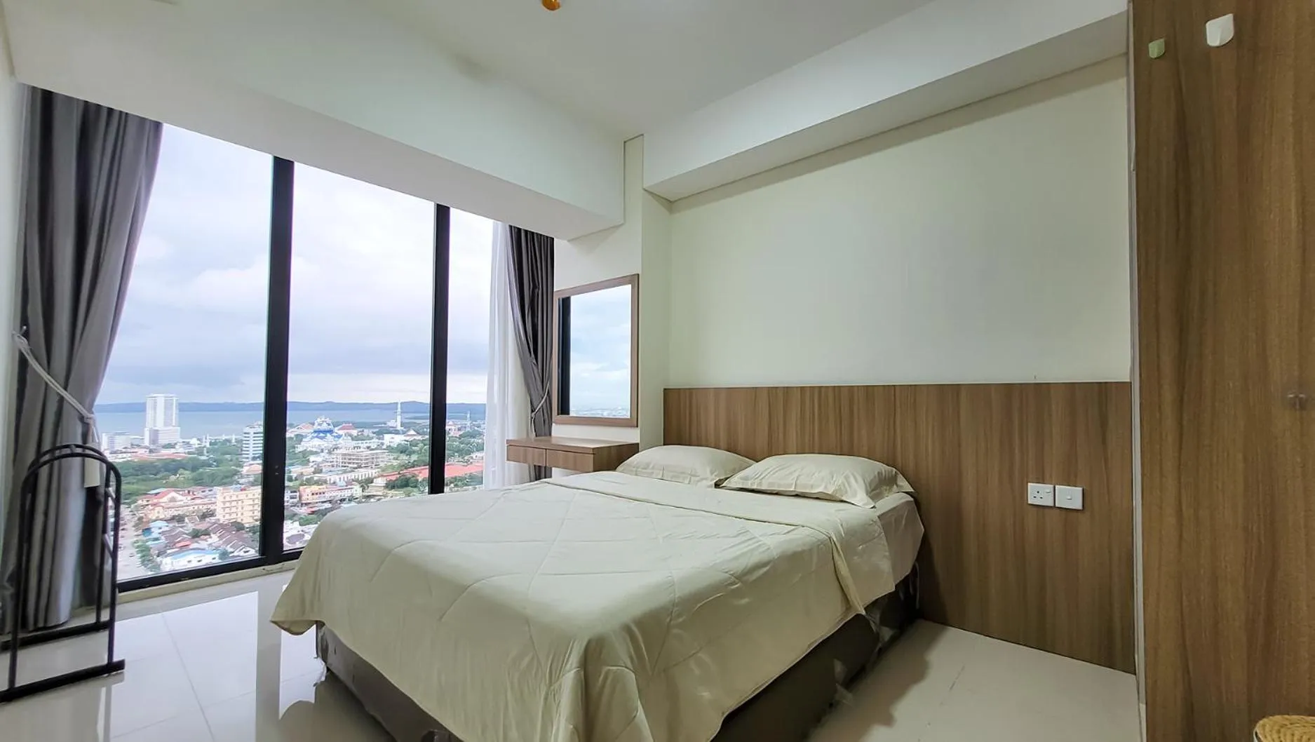 Bed in Palam Mansion at Meisterstadt Pollux Habibie Apartment