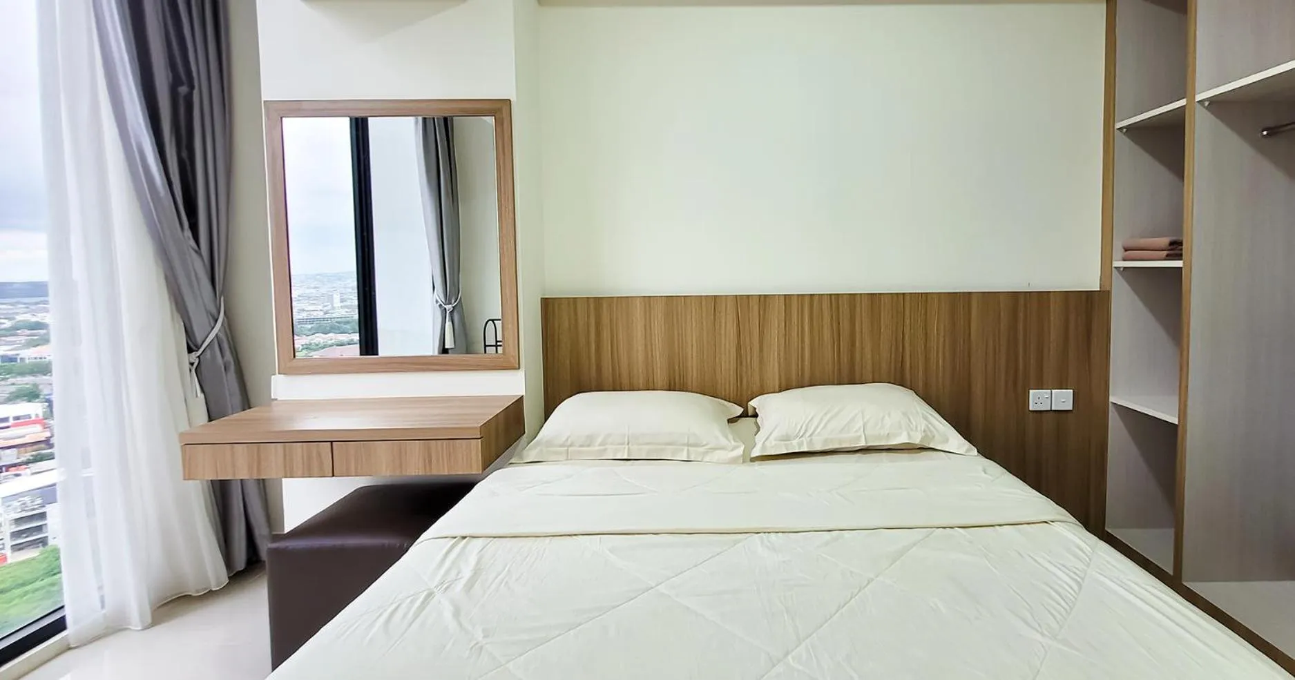 Bed in Palam Mansion at Meisterstadt Pollux Habibie Apartment