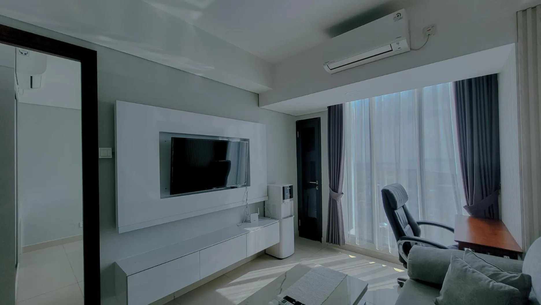 Communal lounge/ TV room in Palam Mansion at Meisterstadt Pollux Habibie Apartment