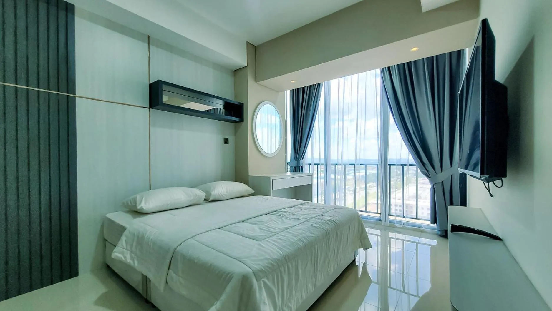 Bed in Palam Mansion at Meisterstadt Pollux Habibie Apartment