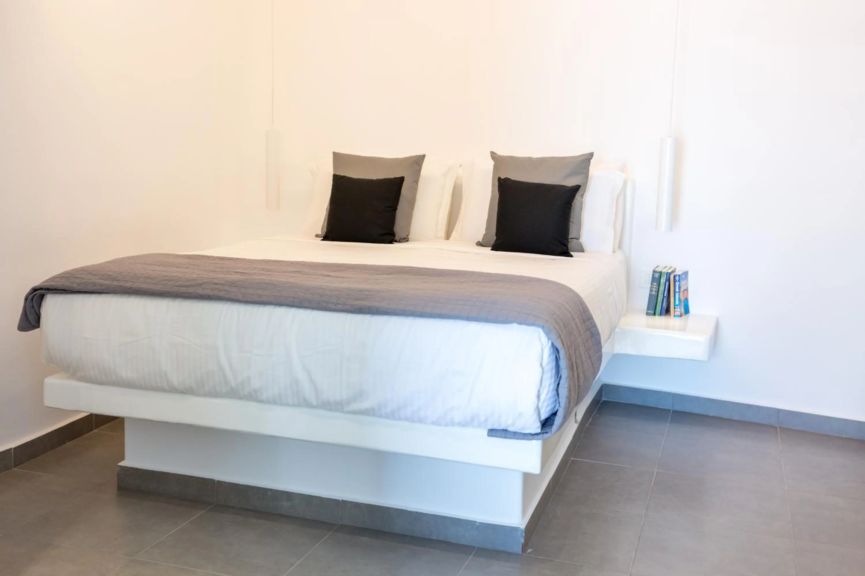 Bed in Dreaming View Suites