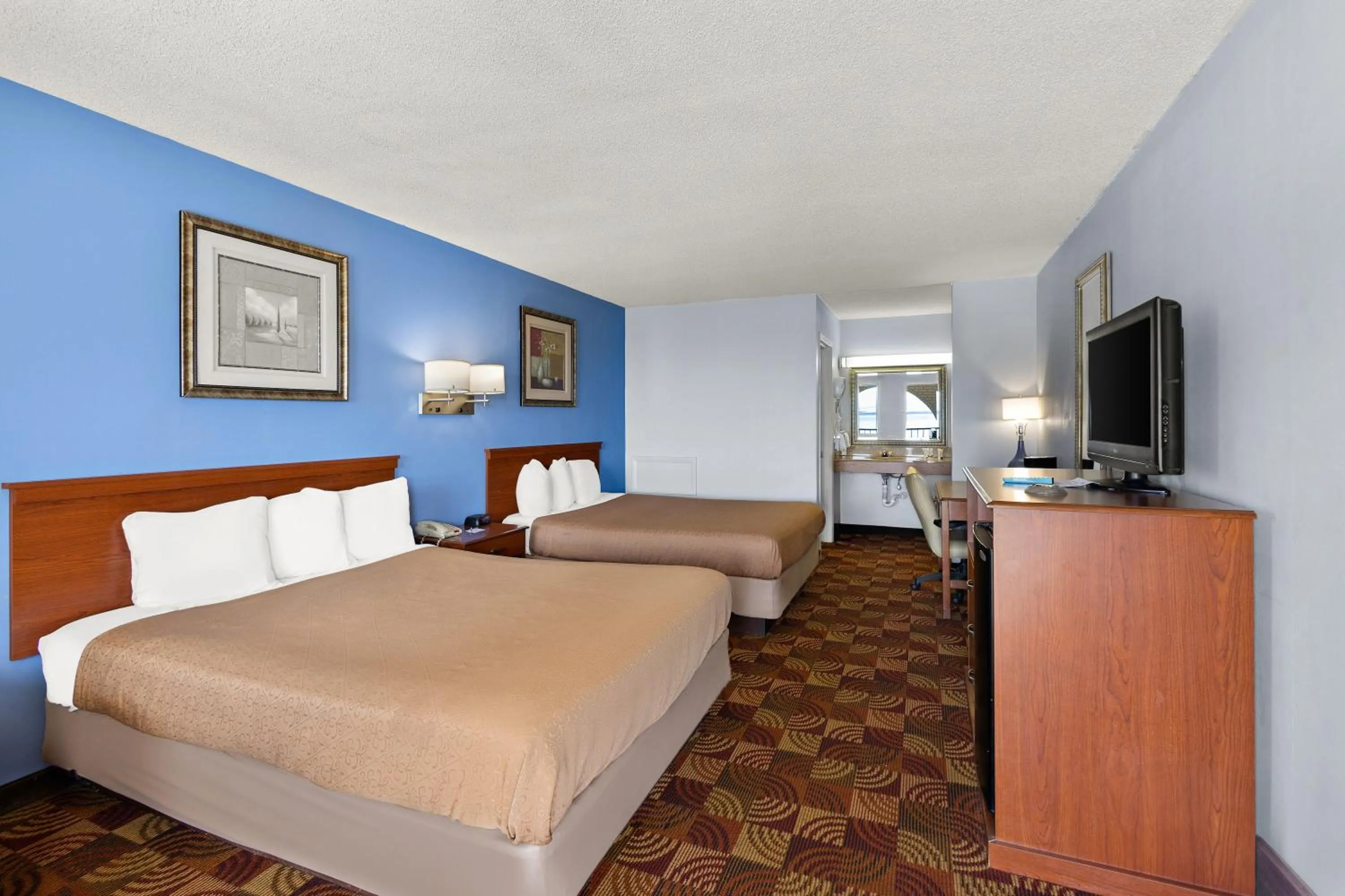 Bed in Americas Best Value Inn-Celina
