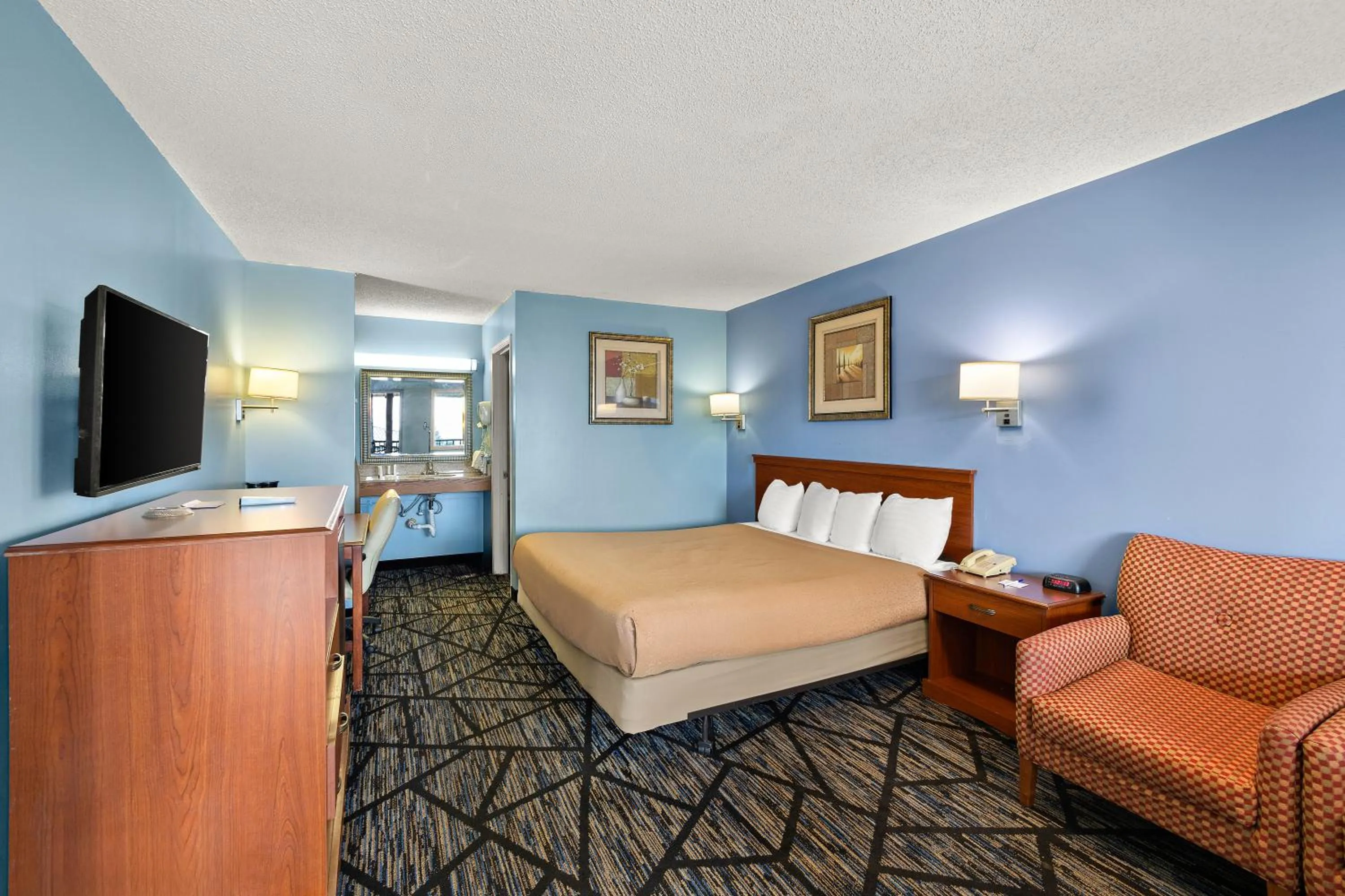 Bed in Americas Best Value Inn-Celina